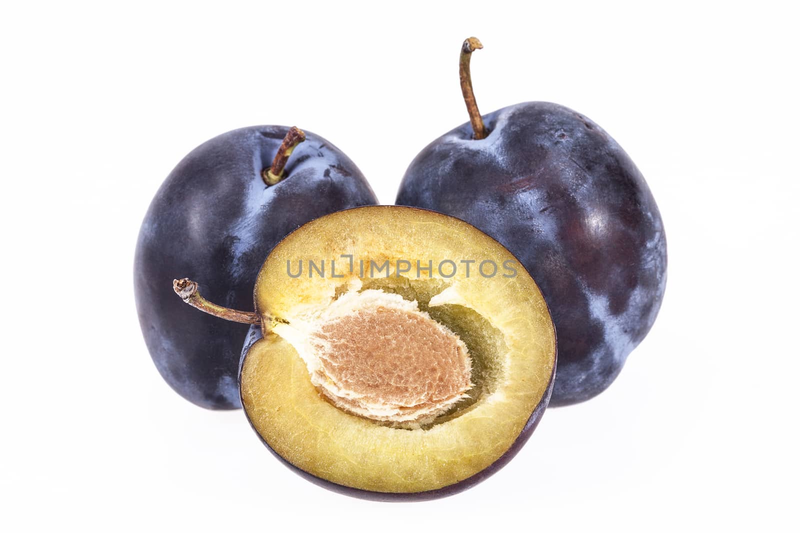 some fruits of plum isolated on white background, close up
