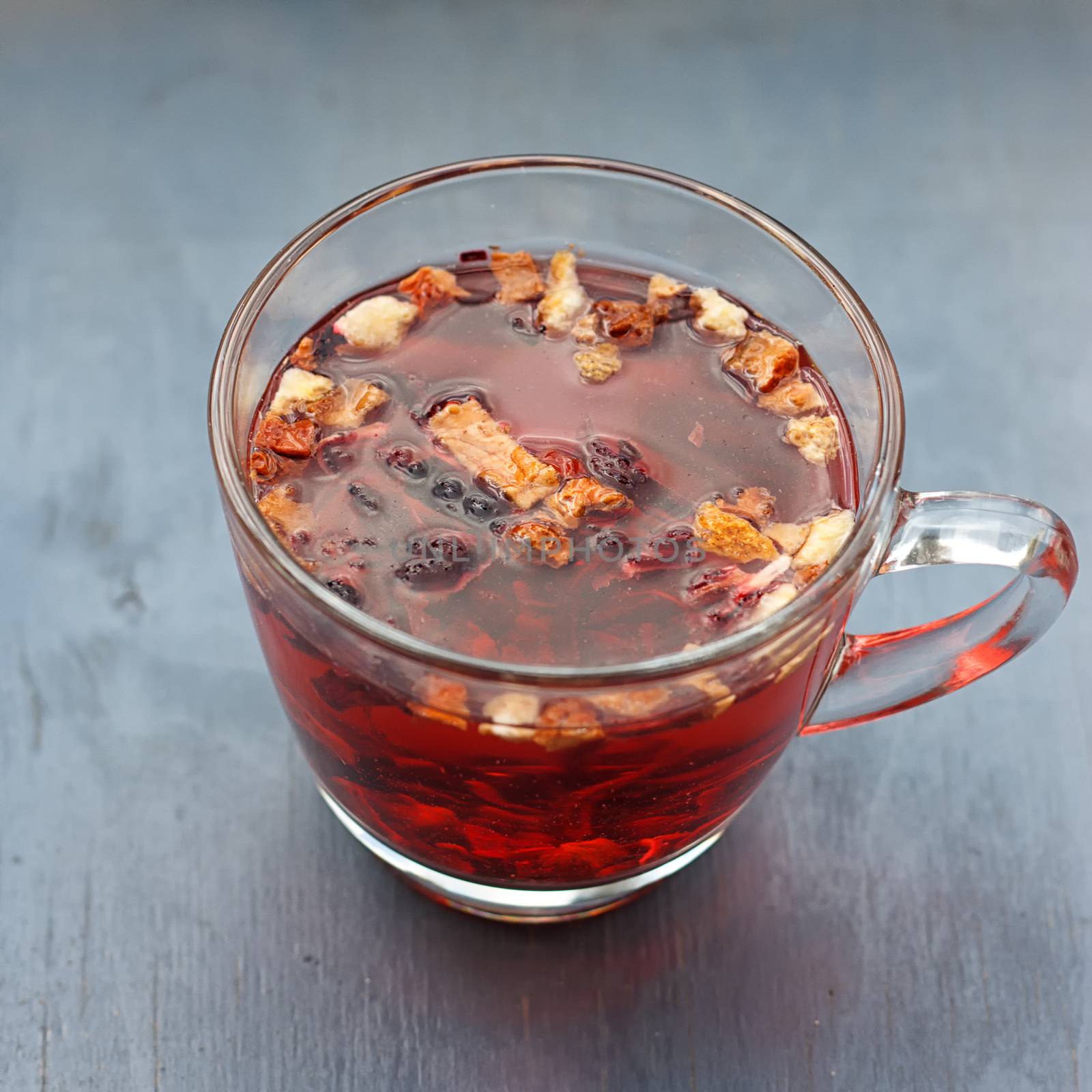 Red fruit tea in transparent glass Cup by victosha
