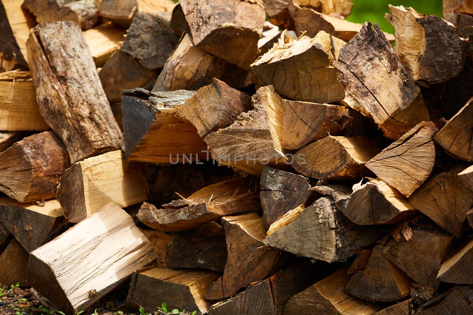 Firewood. Dry firewood in a pile for furnace kindling