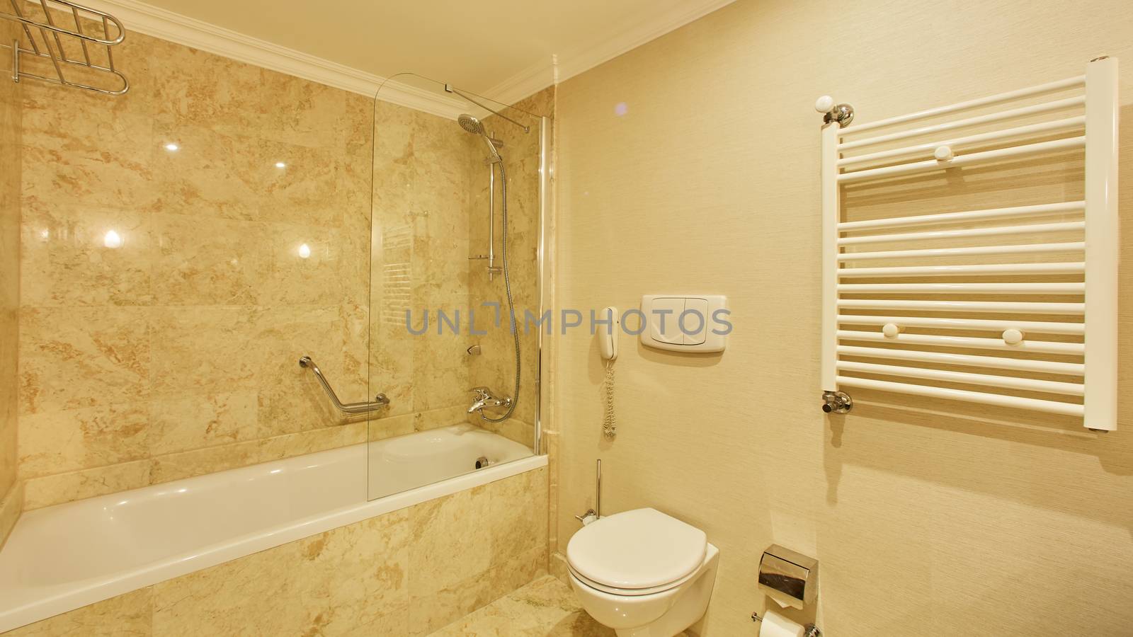 Luxury bathroom with mirrors, sink, shower and toilet.