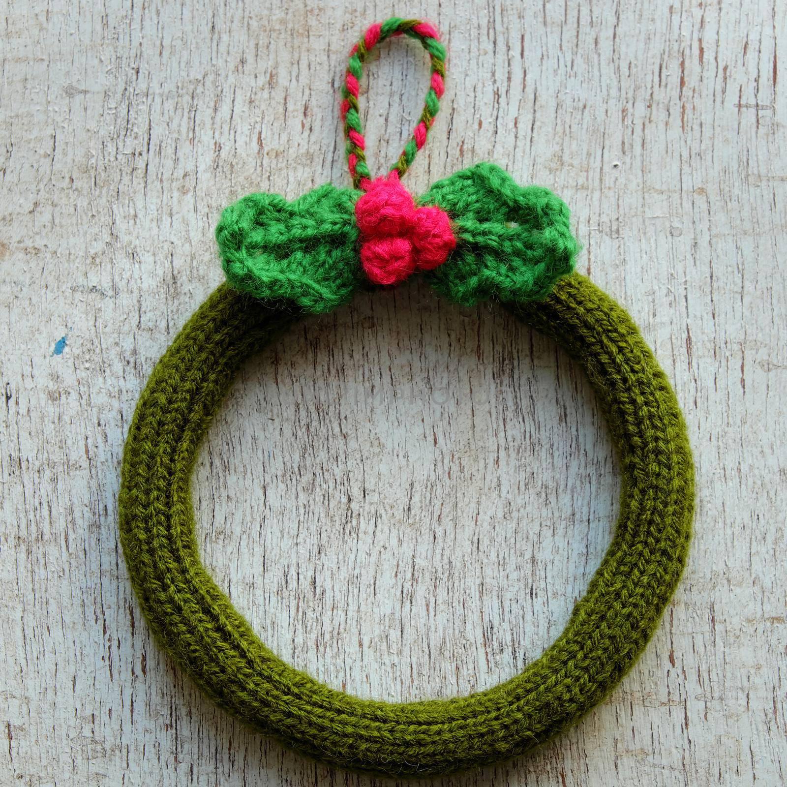 Diy Christmas wreath for decoration the door on Xmas holiday, a traditional festive in winter,  knit in round to make wreaths for christmas decoration