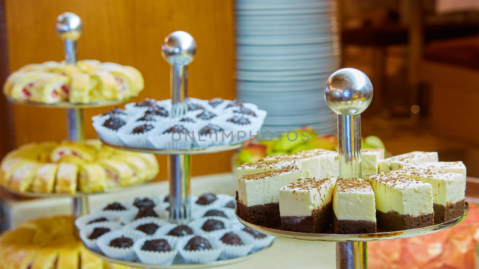 Dessert table for a party. akes and sweetness. Shallow dof