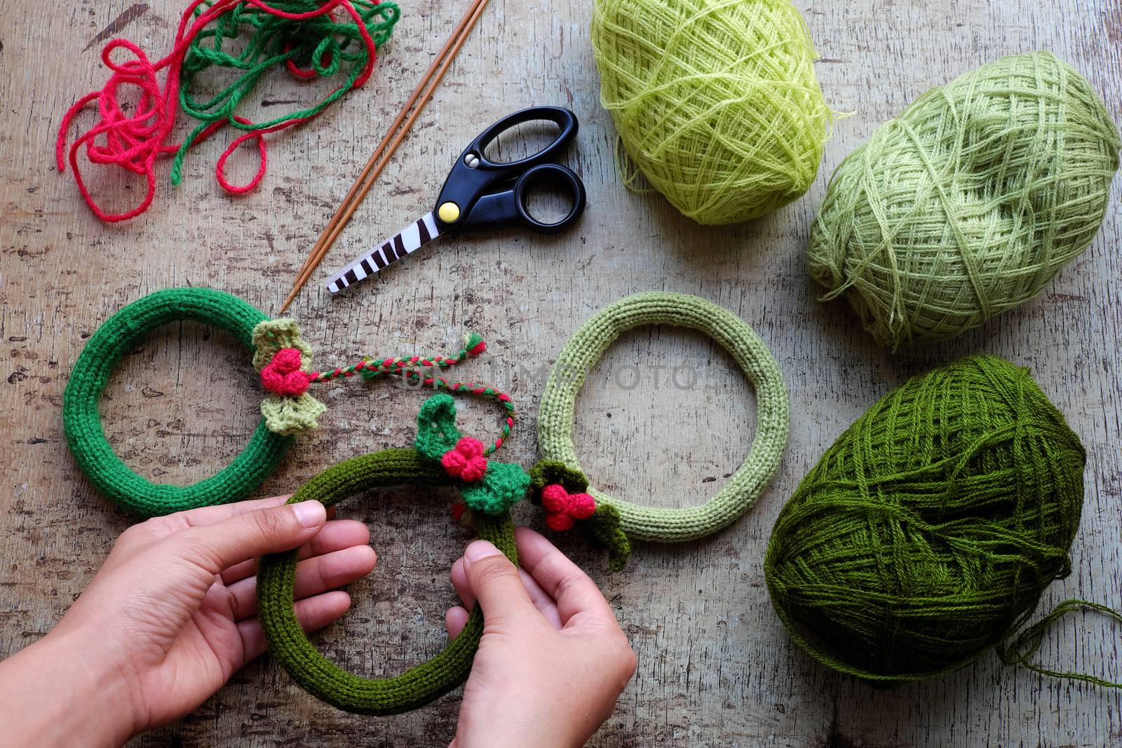 Diy Christmas wreath for decoration the door on Xmas holiday, a traditional festive in winter,  knit in round to make wreaths for christmas decoration