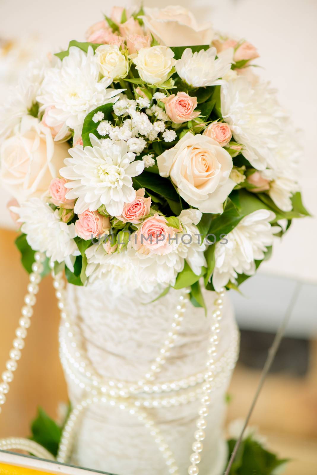 Close-up of a wedding table decoration with flowers