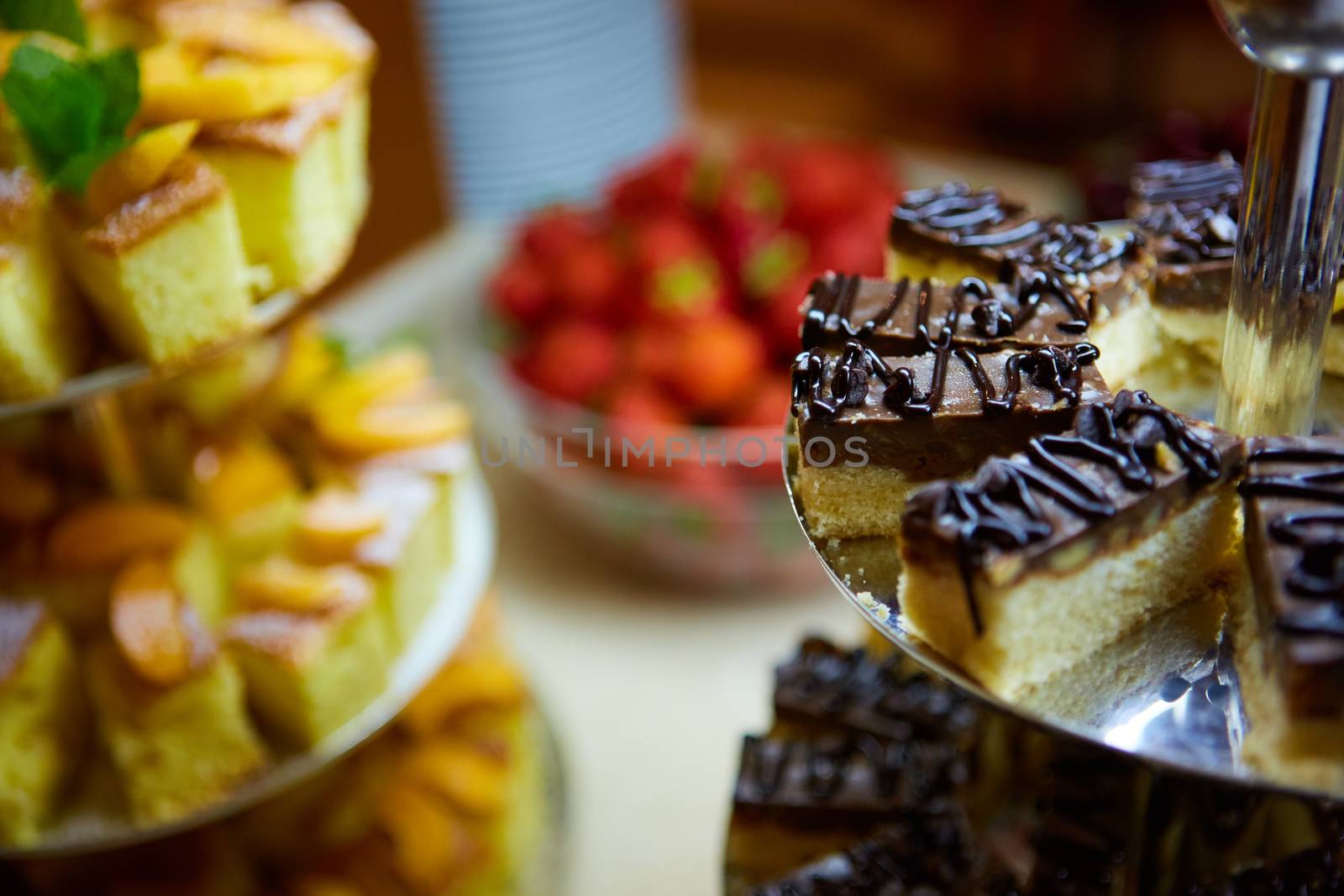 Dessert table for a party. akes and sweetness. Shallow dof