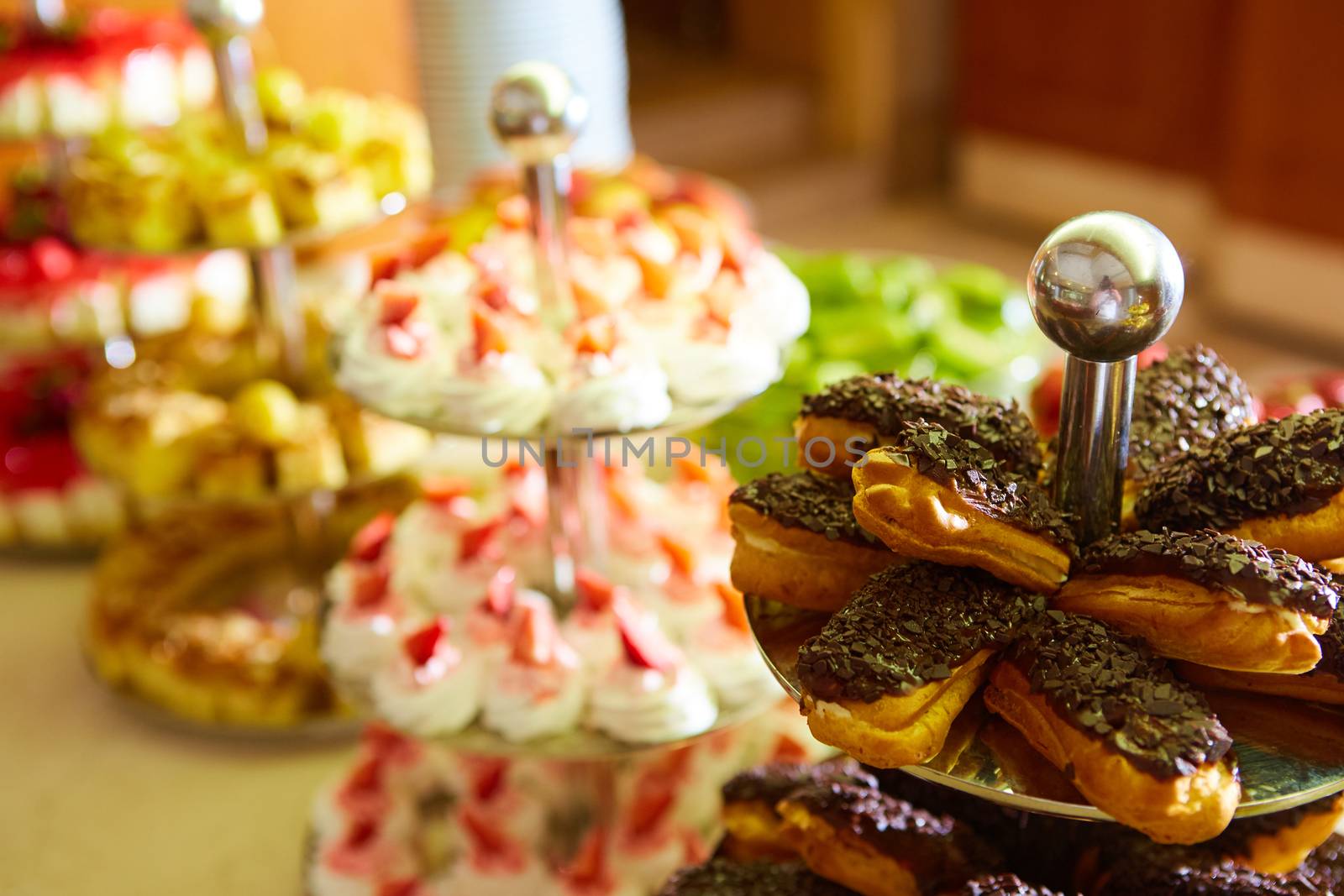 Dessert table for a party. akes and sweetness. Shallow dof