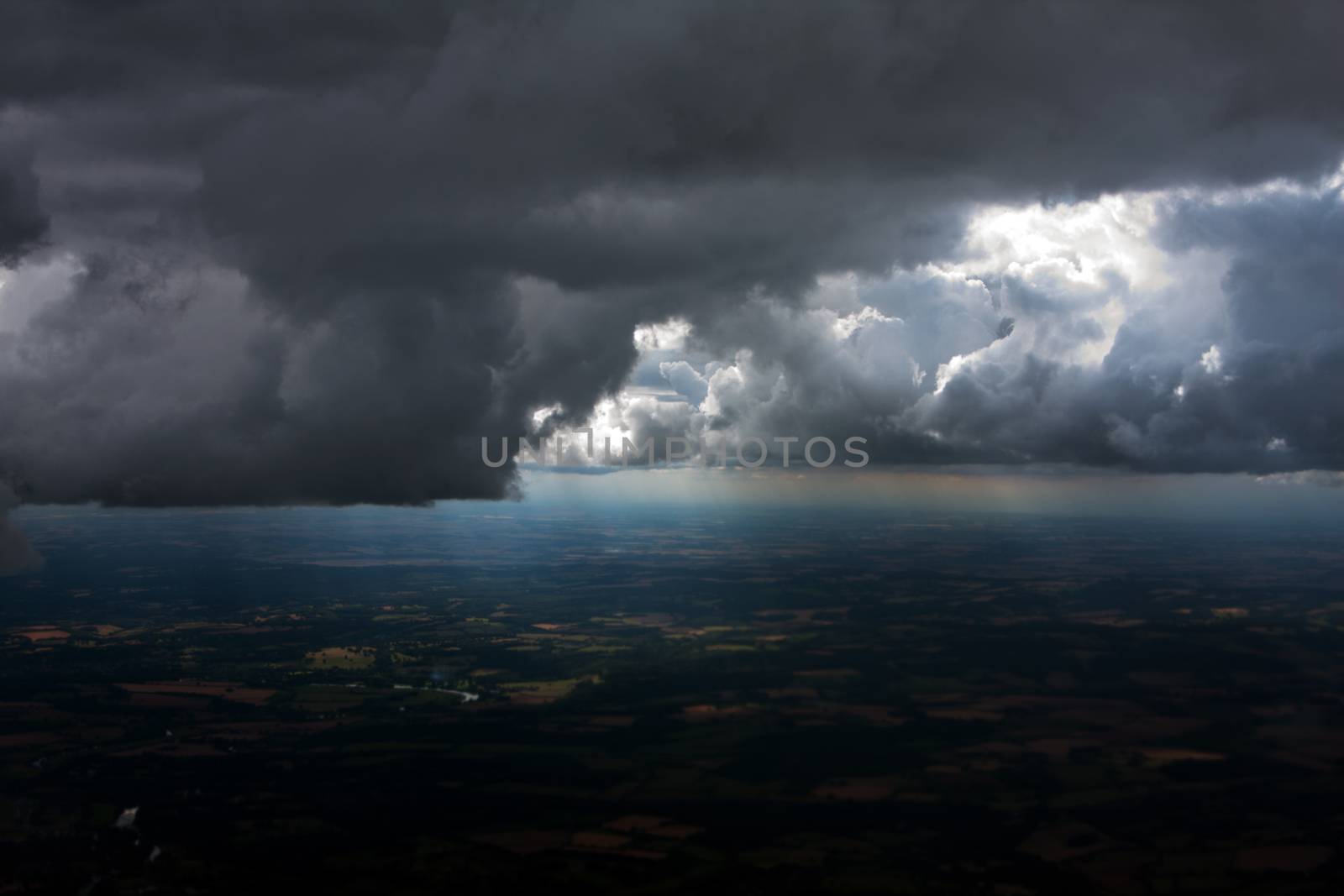 Aerial view of bad weather Storm Clouds above Farmland.