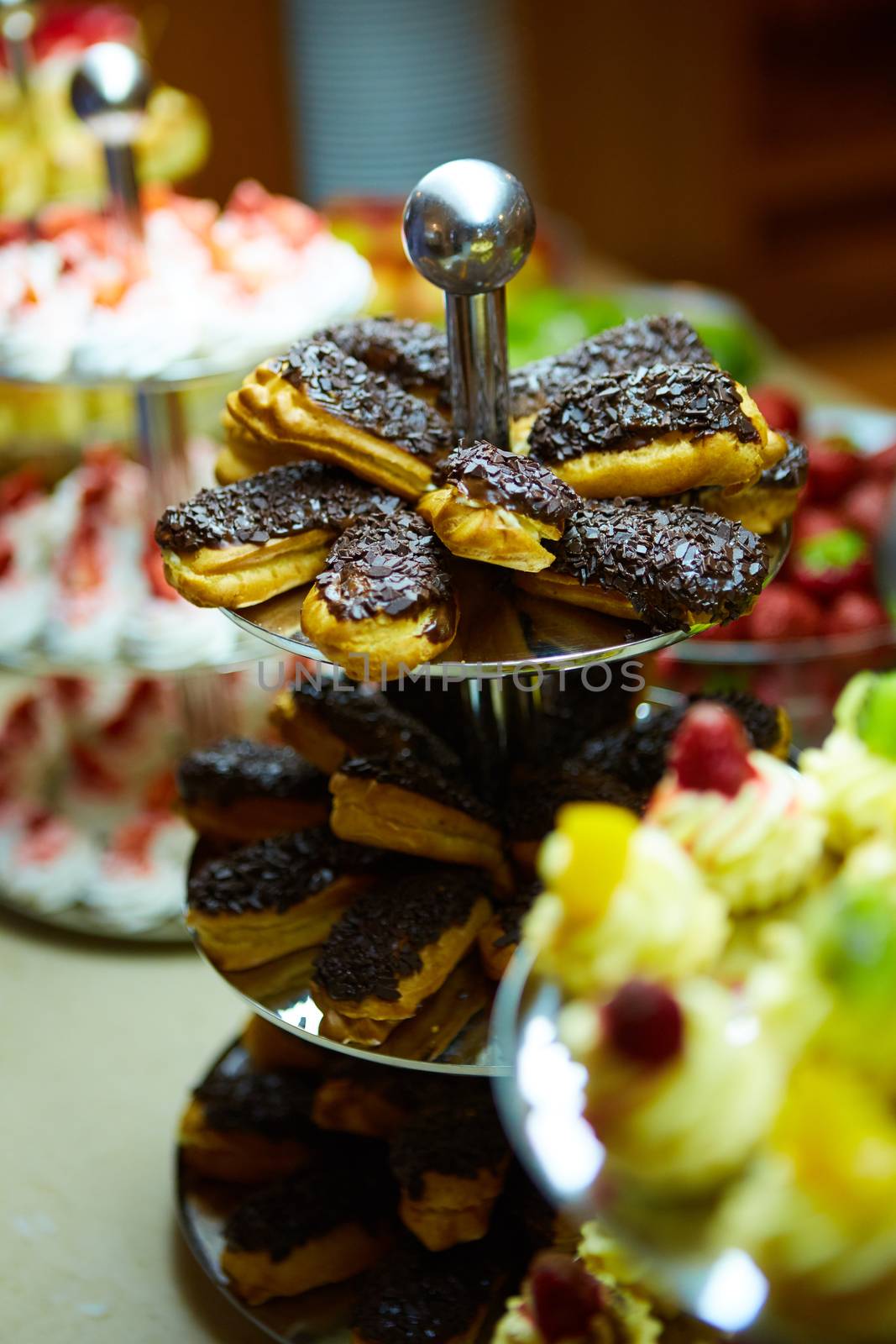 Dessert table for a party. akes and sweetness. Shallow dof