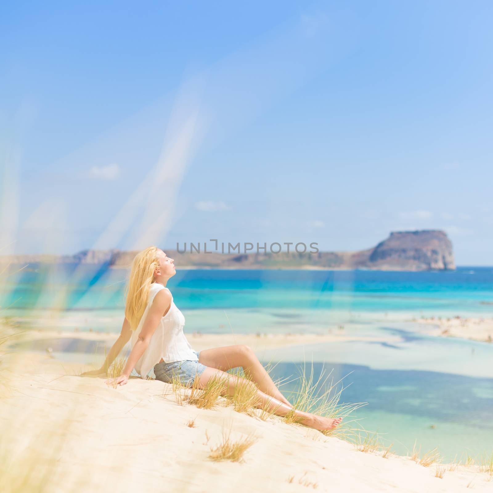 Relaxed Happy Woman Enjoying Sun on Vacations. by kasto