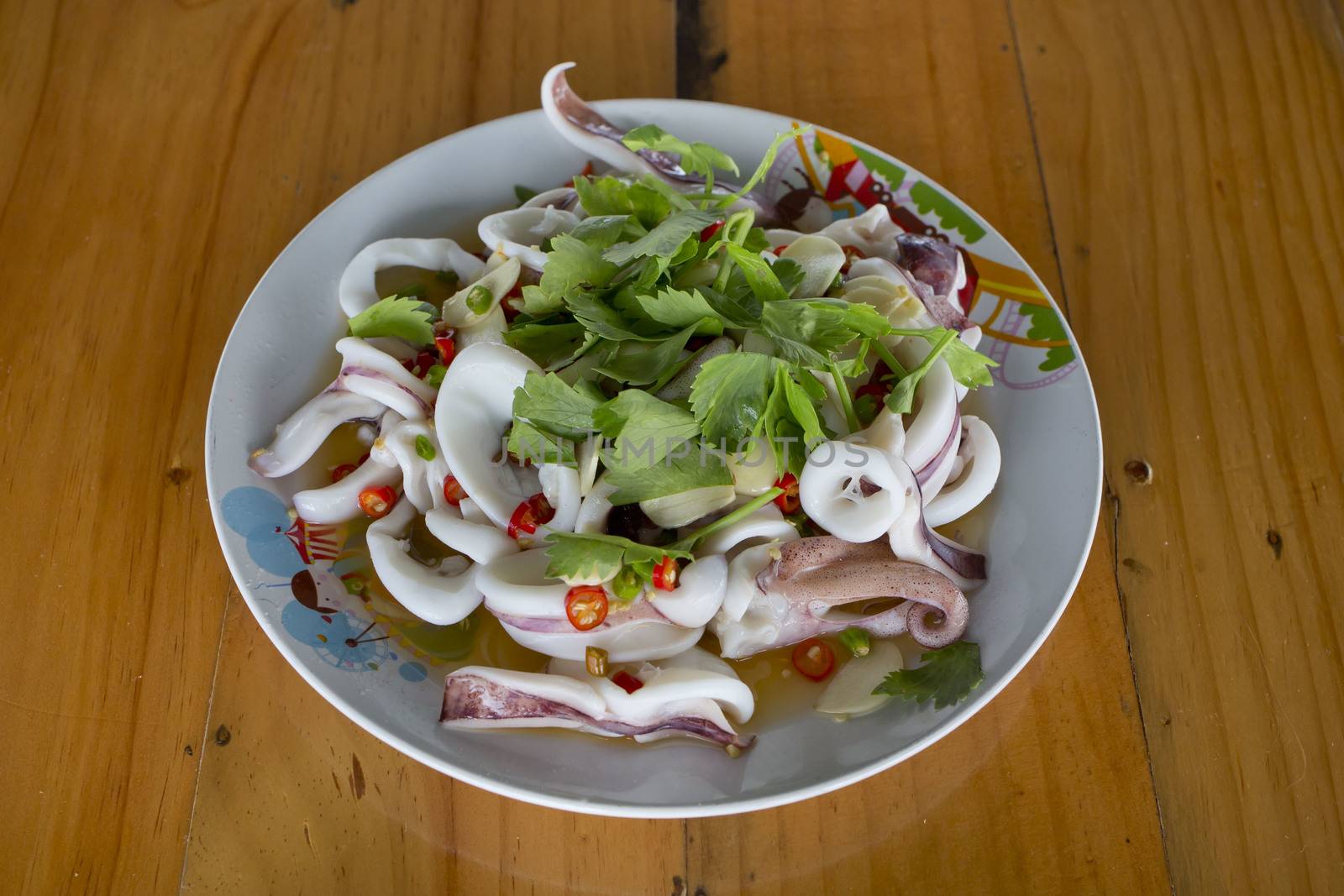 Steam squid with spicy chilli and lemon sauce