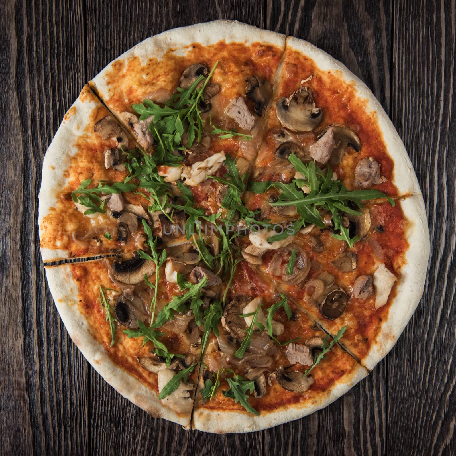 Pizza with chicken mushrooms and rukkola
