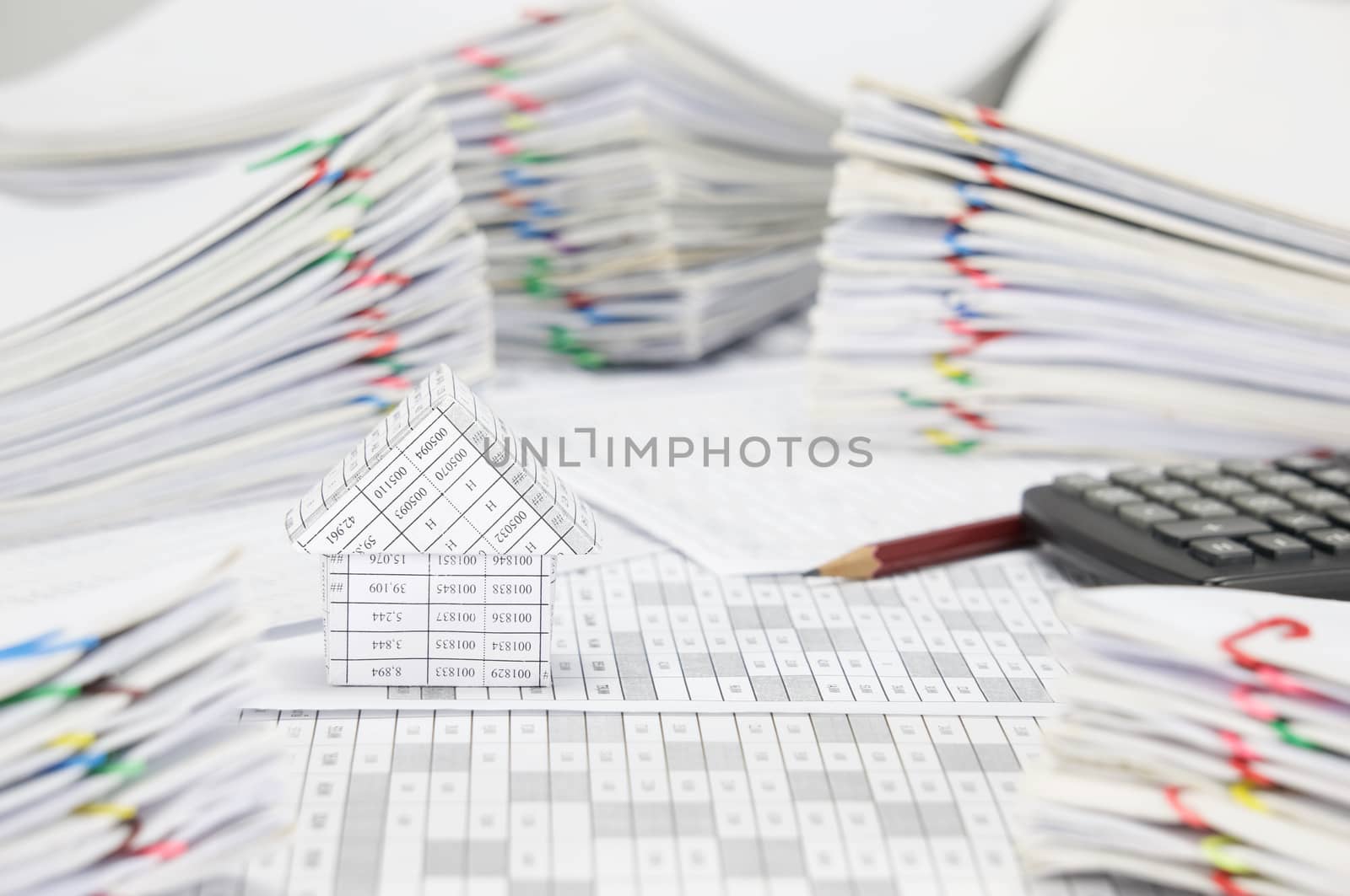 House on finance account have blur brown pencil with calculator by eaglesky