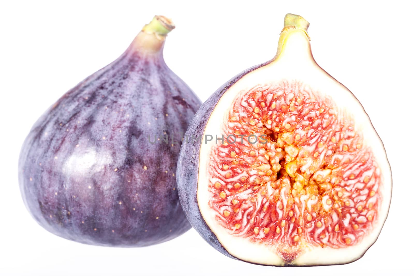 Fruits of fresh fig isolated on white background.
