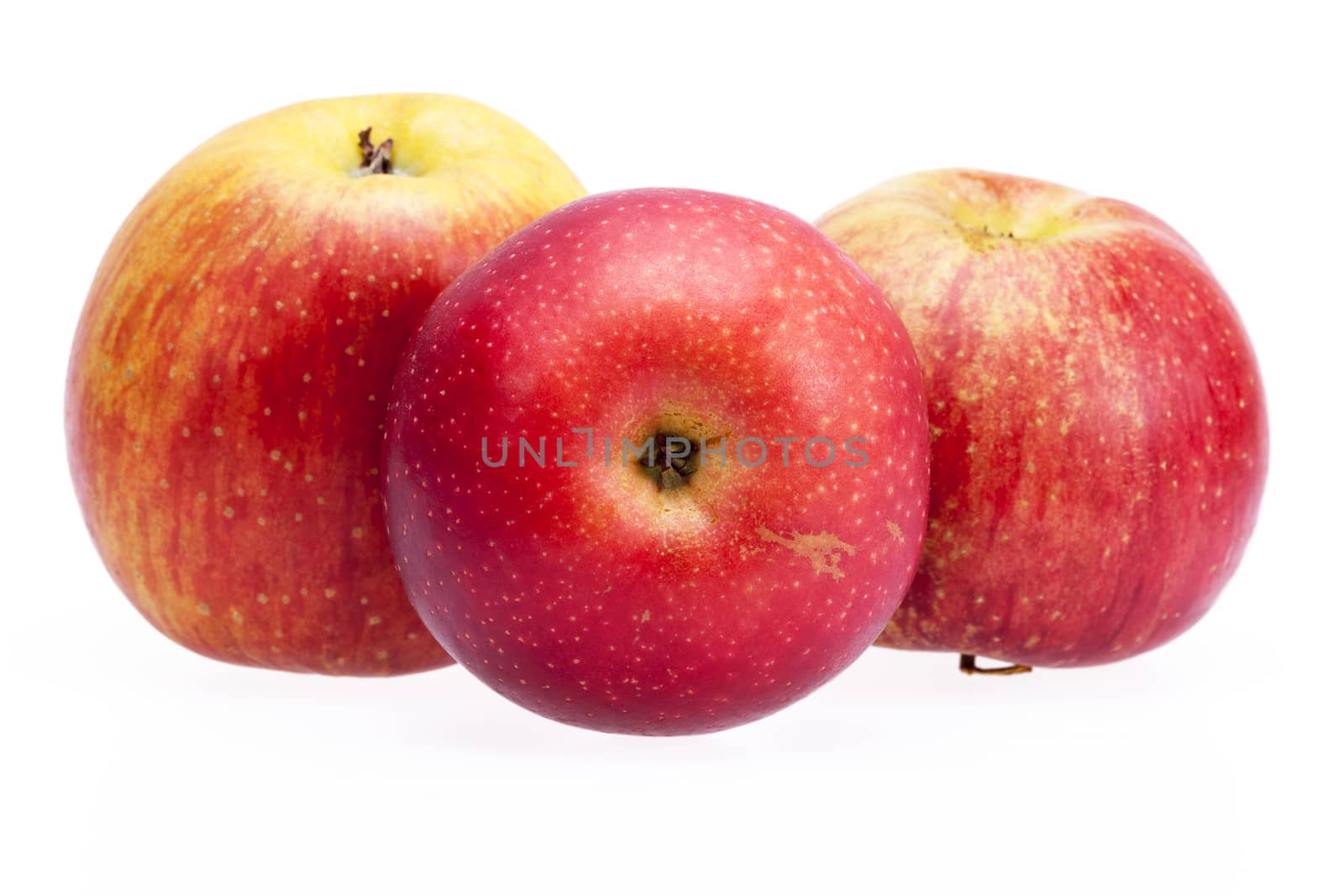 Red apples isolated on white background, close up .