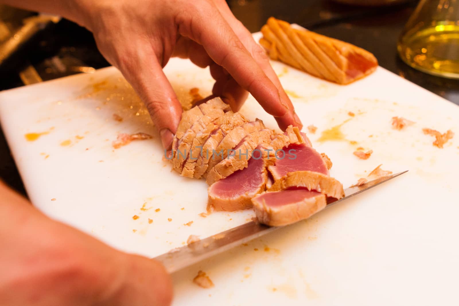 Cook cut with knife medium fried tuna slices starters