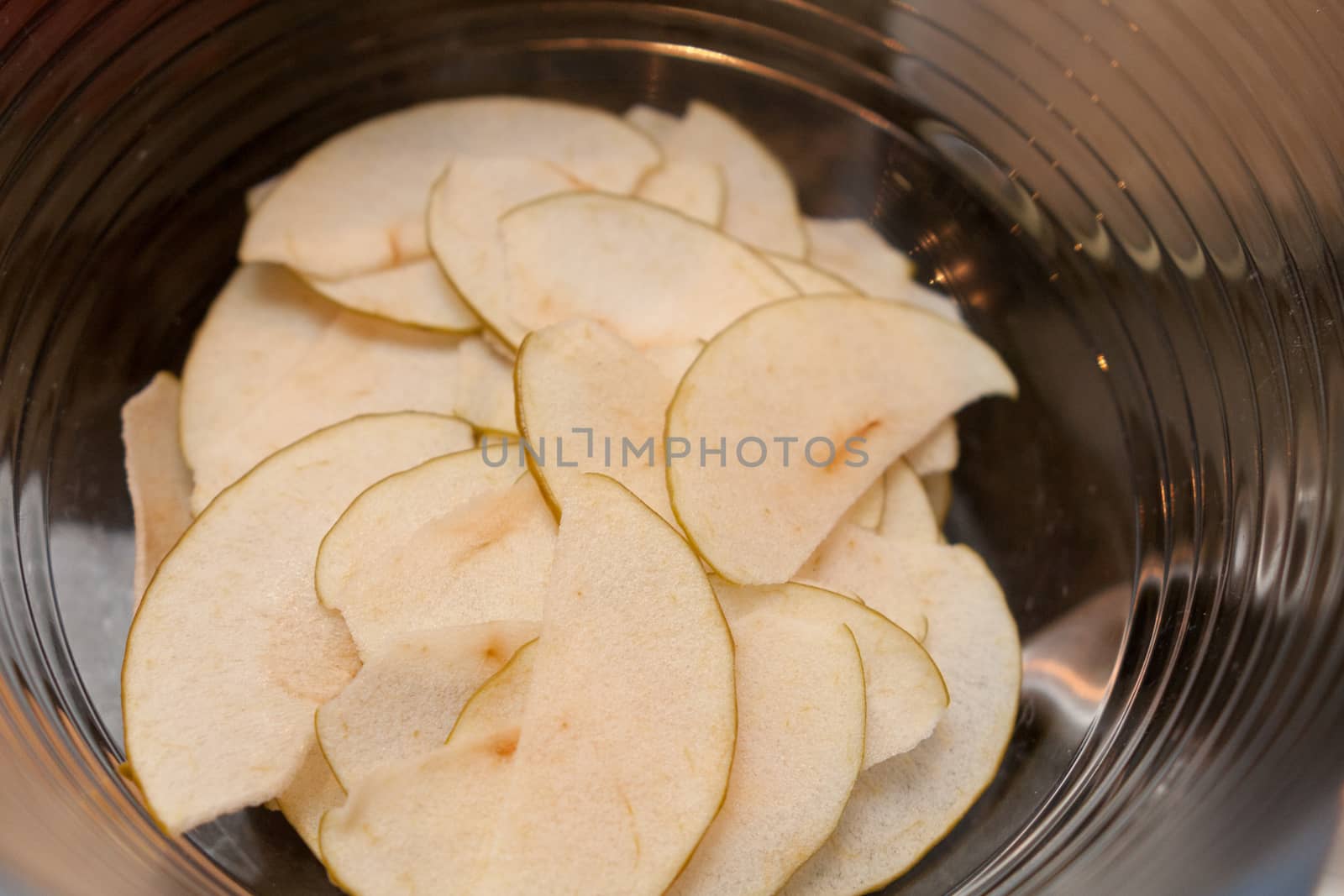finely chopped apples in glass bowl