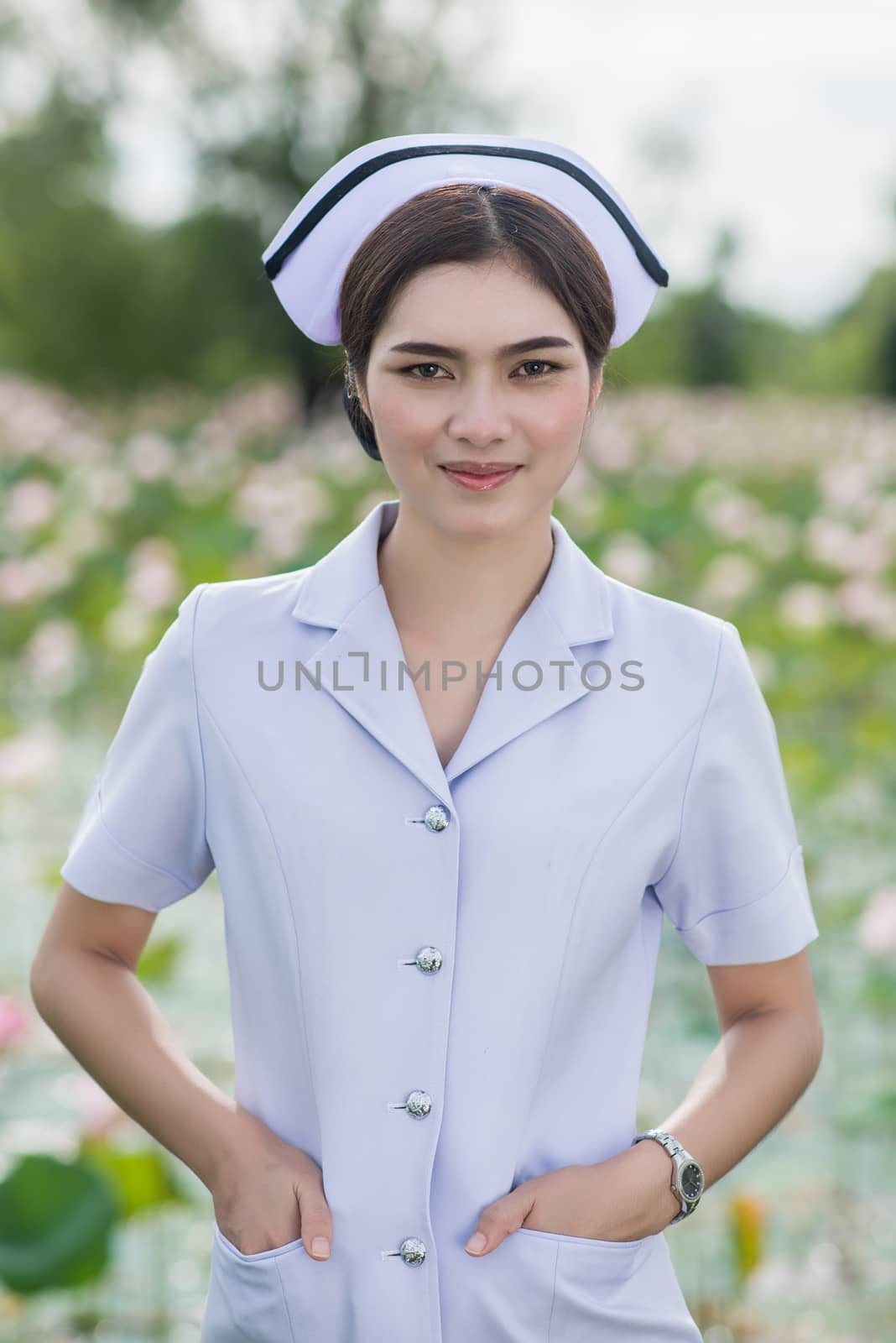 Portrait of a Beautiful Young Woman Asian Nurse by chanwity