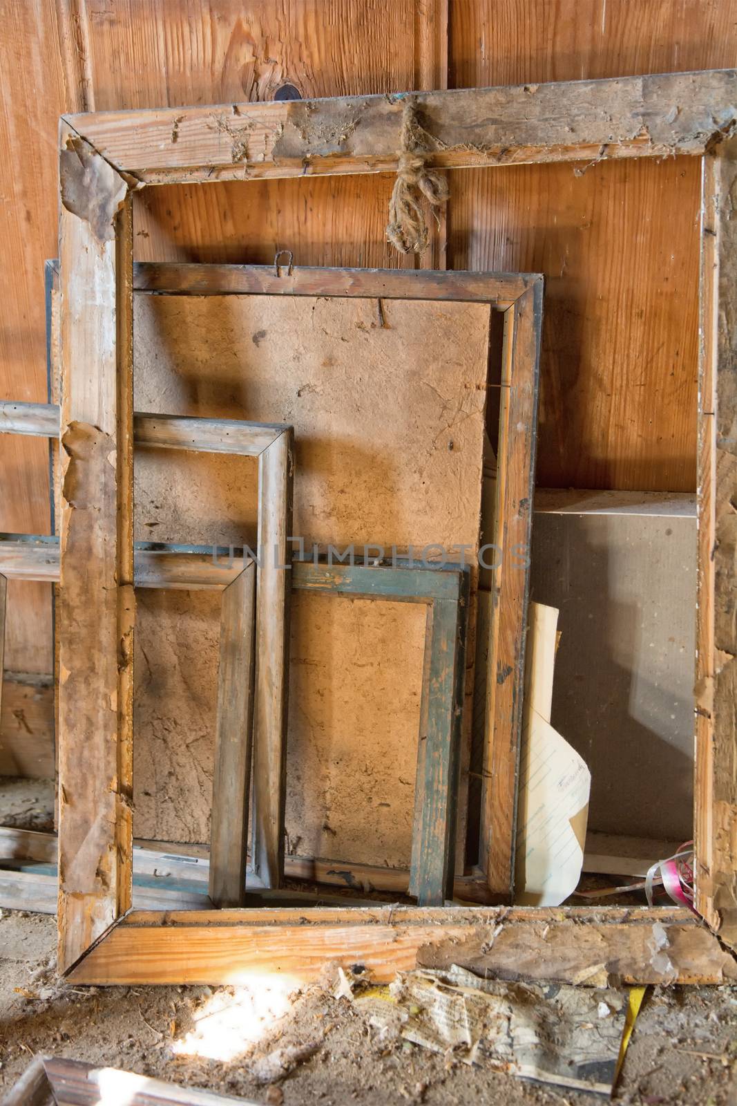 Old dusty wooden frames for paintings