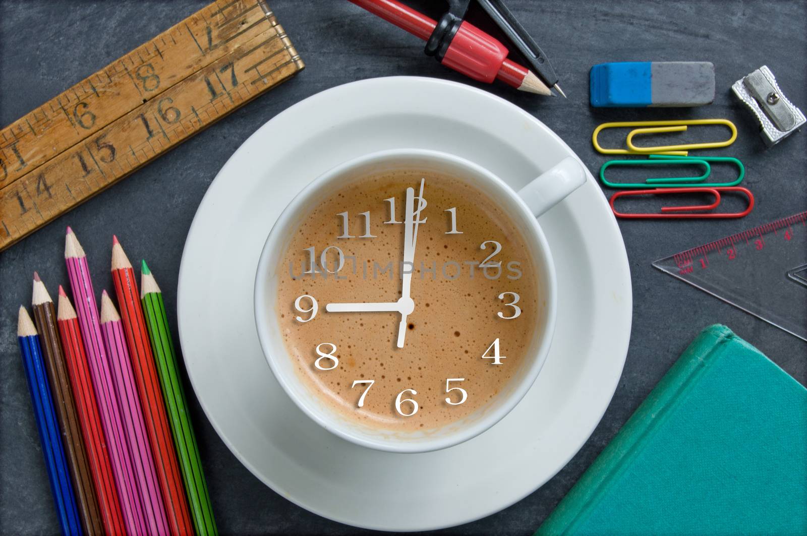 Clock hands inside a cup of coffee with stationery and college objects  