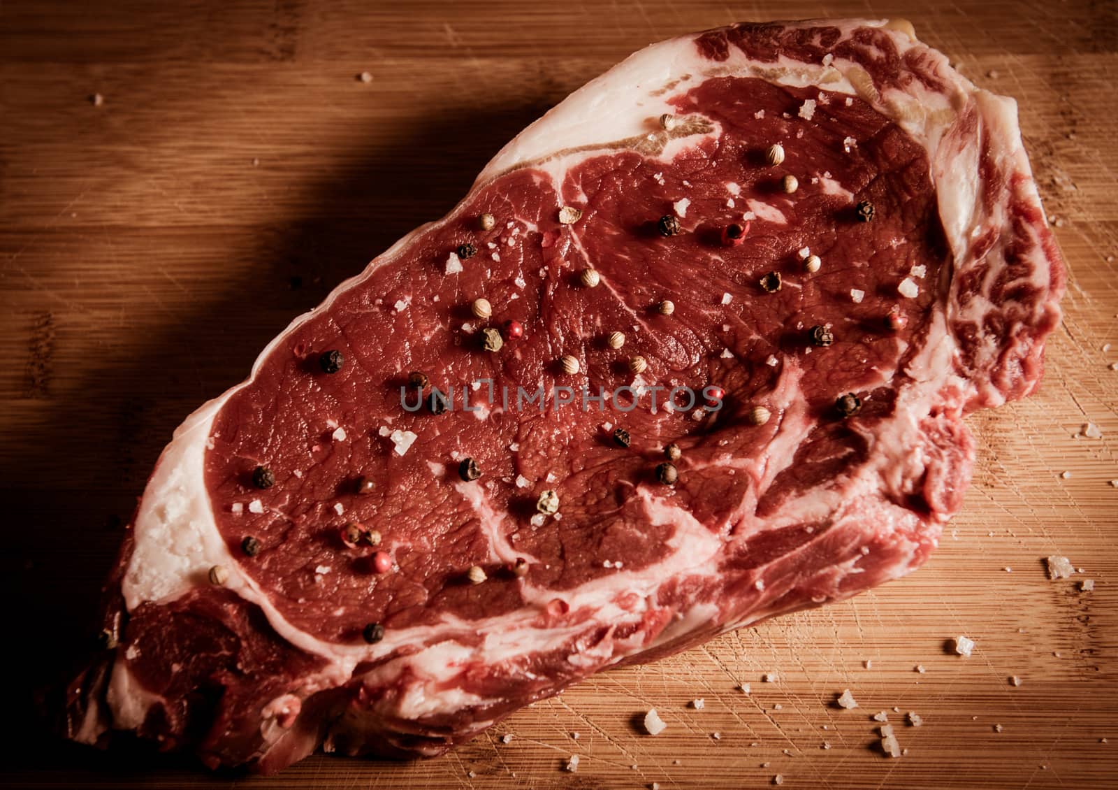 Entrecote steak of beef on a wooden board, studio shoot
