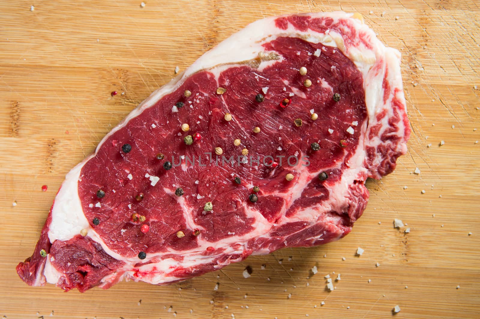 Entrecote steak of beef on a wooden board, studio shoot