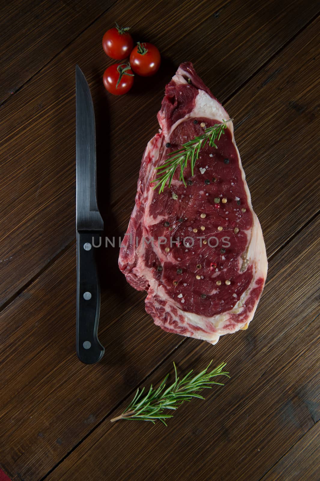 Entrecote steak of beef on a wooden board, studio shoot