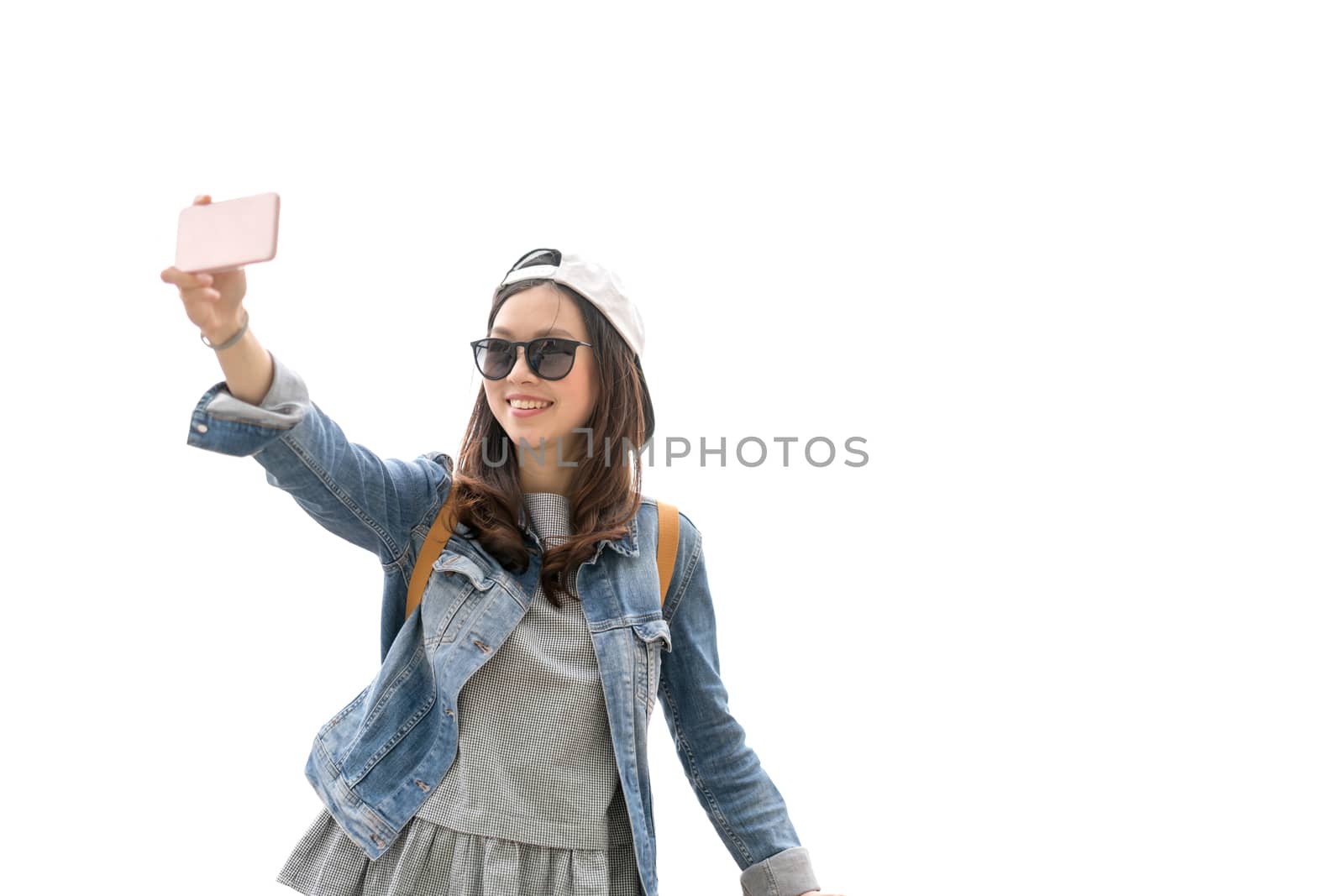 Beautiful Asian traveler woman taking selfie with the copy space, isolate on white background, travel concept