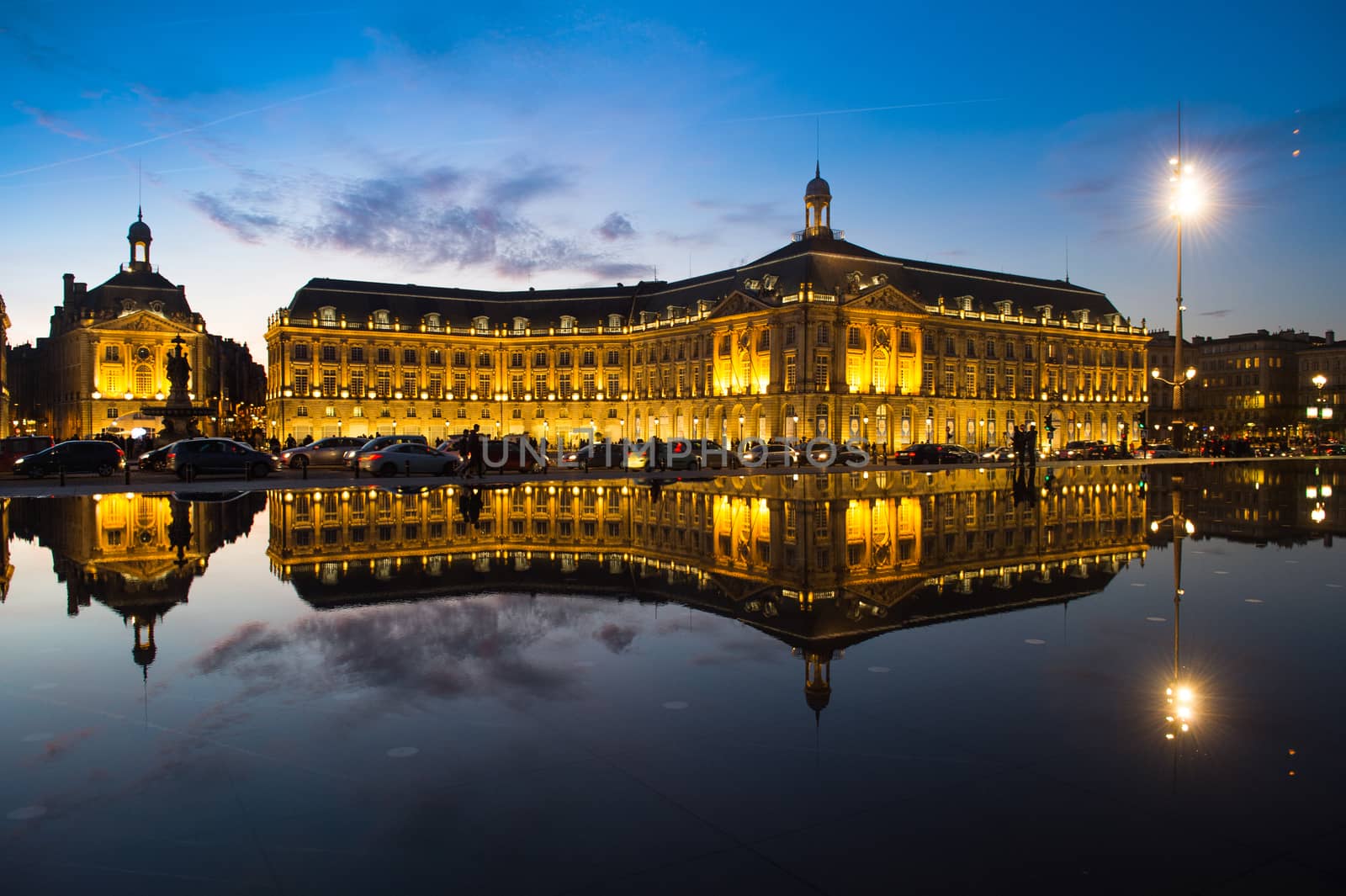 Bordeaux, France, Illuminated Reflection In Water At Place De La Bourse Against Sky