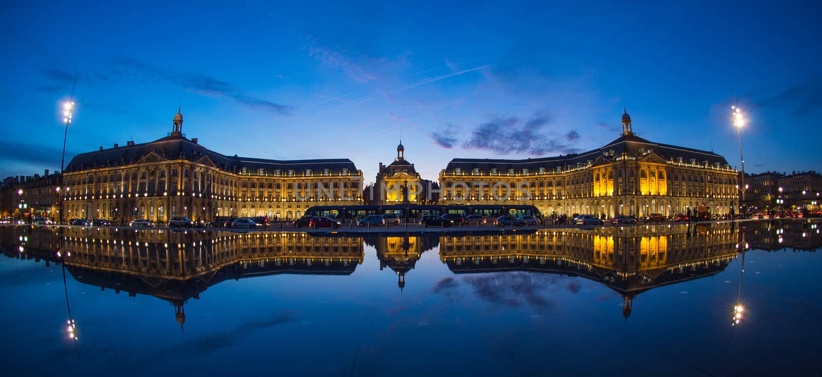 Bordeaux, France, Illuminated Reflection In Water At Place De La Bourse Against Sky
