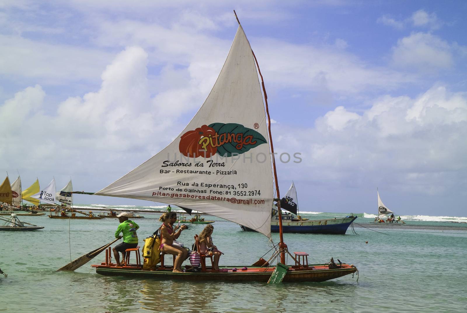 Beach with typical sail boats of northeast Brazil by marphotography