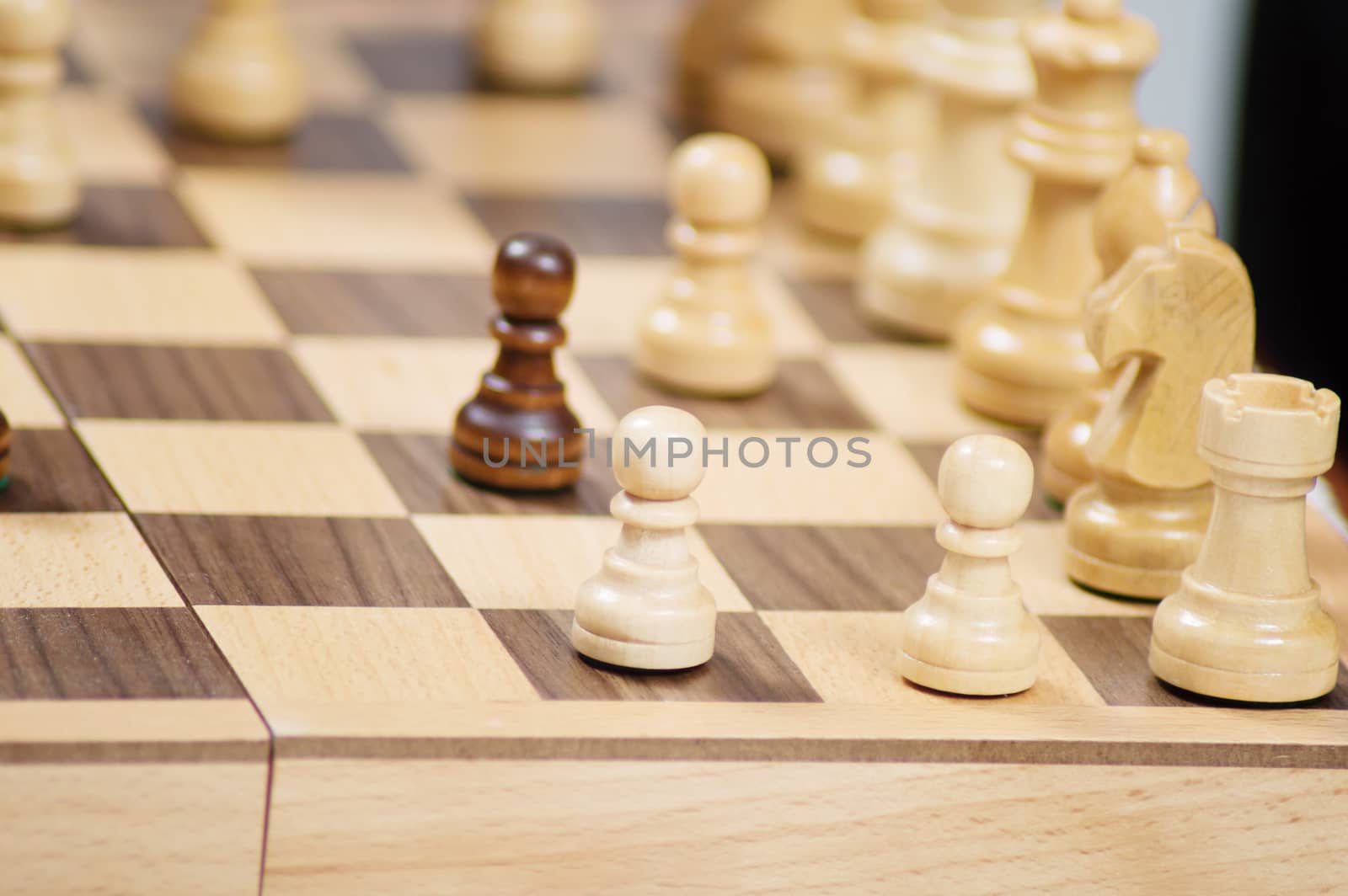 In this game, the pawne are placed against each other
