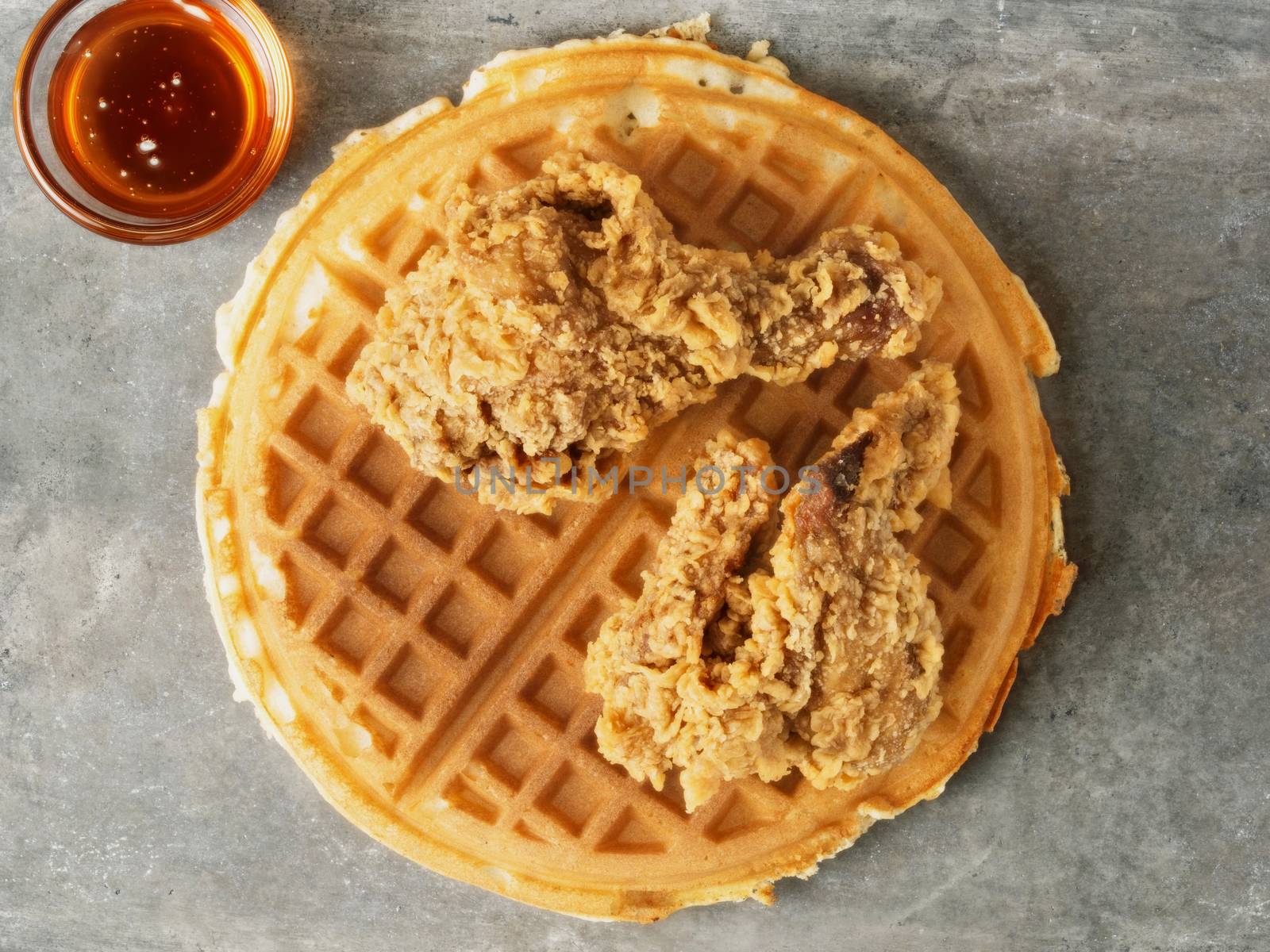 close up of rustic southern american comfort food chicken waffle