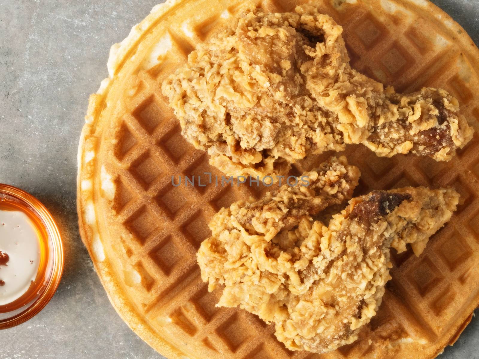 close up of rustic southern american comfort food chicken waffle