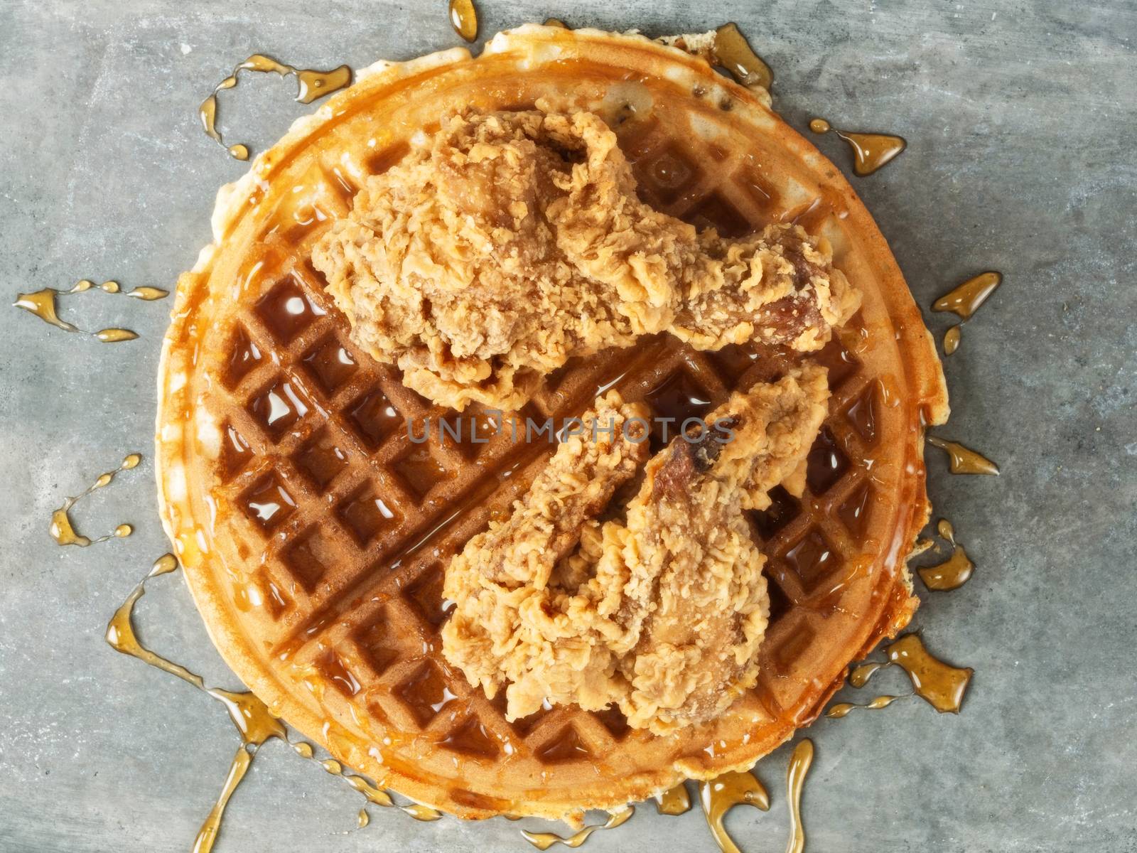 close up of rustic southern american comfort food chicken waffle