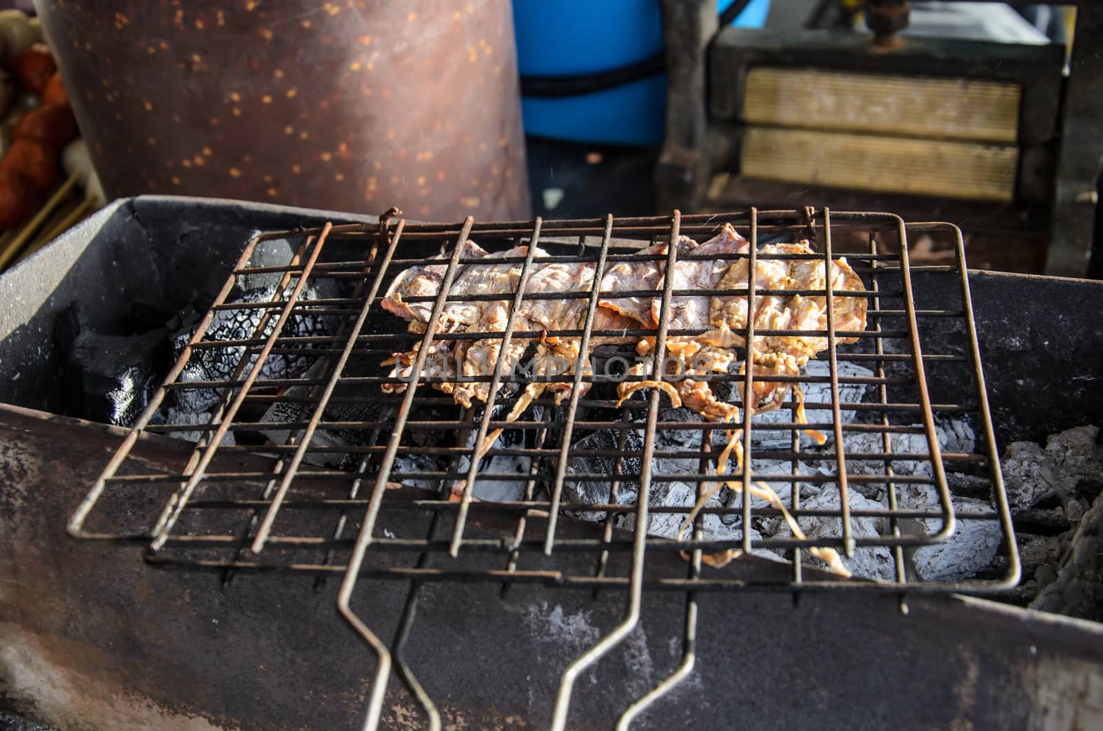 Dried squid, grilled on charcoal by worrayuth