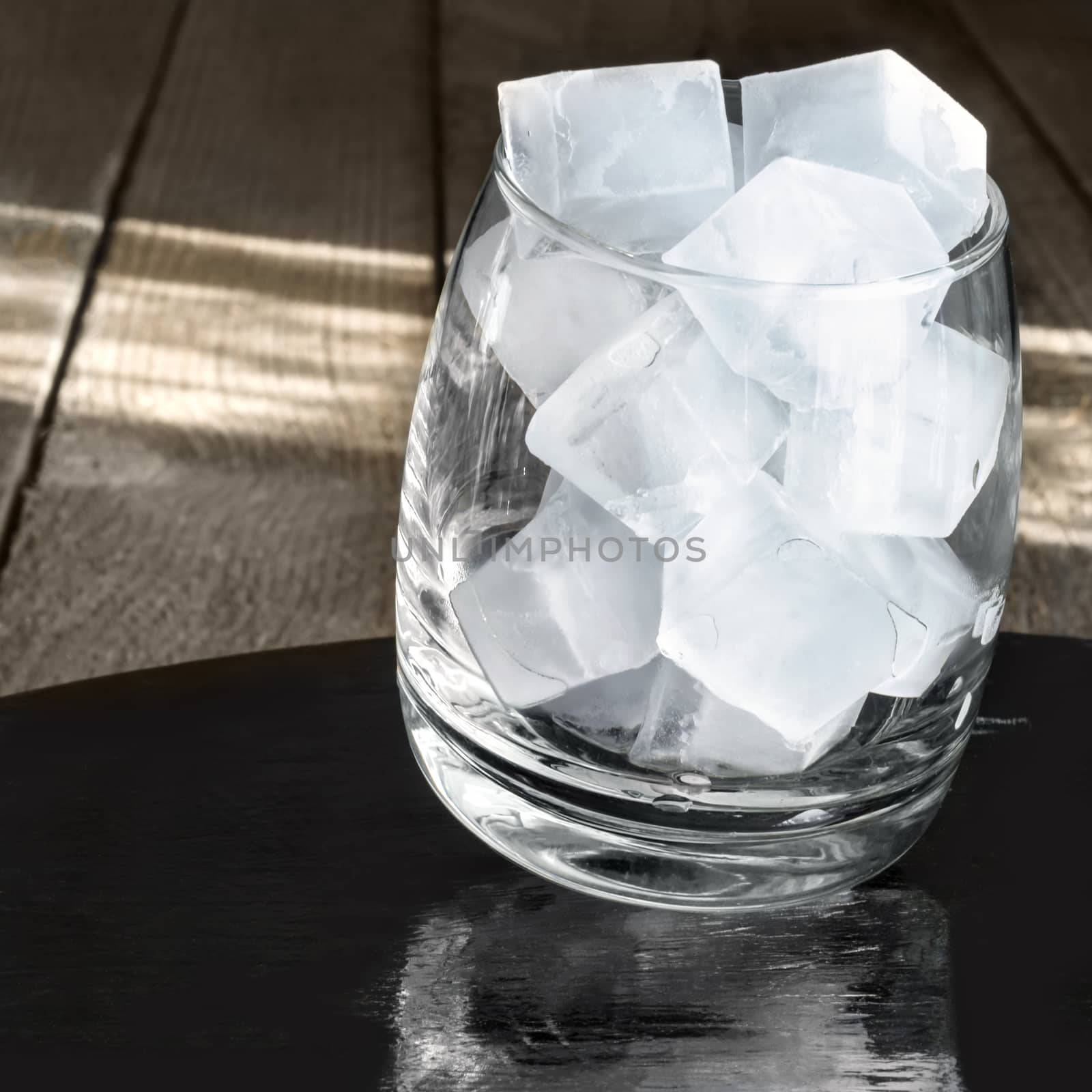 Ice cubes in a glass by Gaina