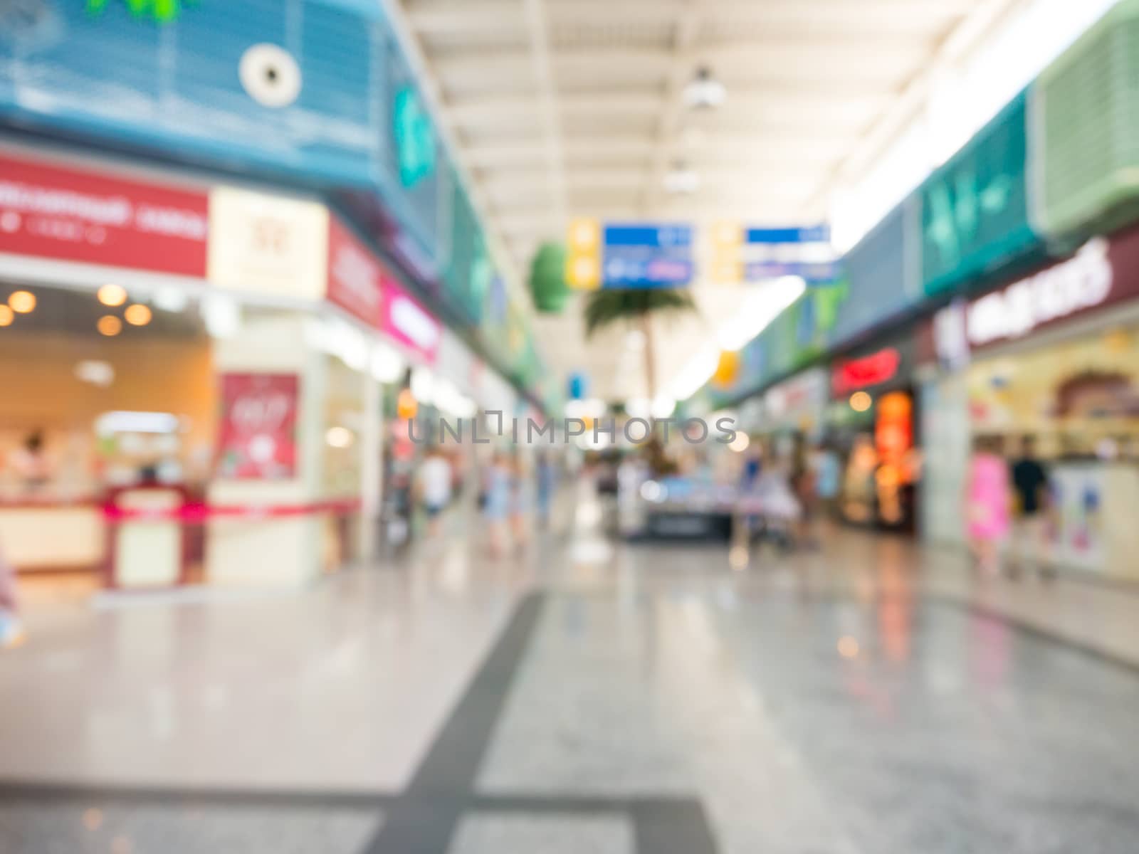 Abstract blurred background of shopping mall hall by fascinadora