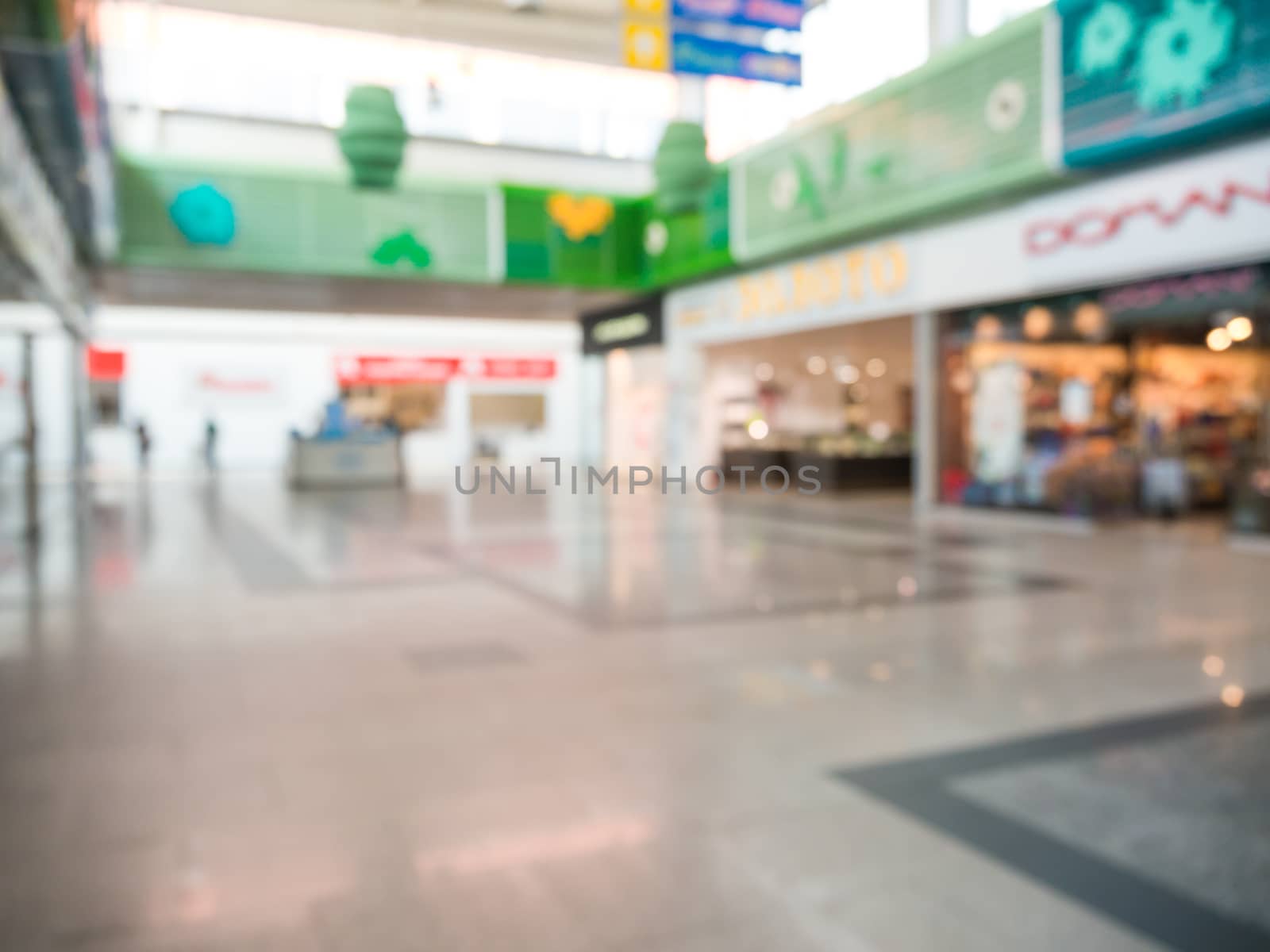 Abstract blurred background of shopping mall hall by fascinadora