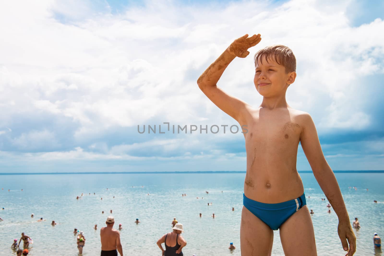 Baby boy at beach by rusak