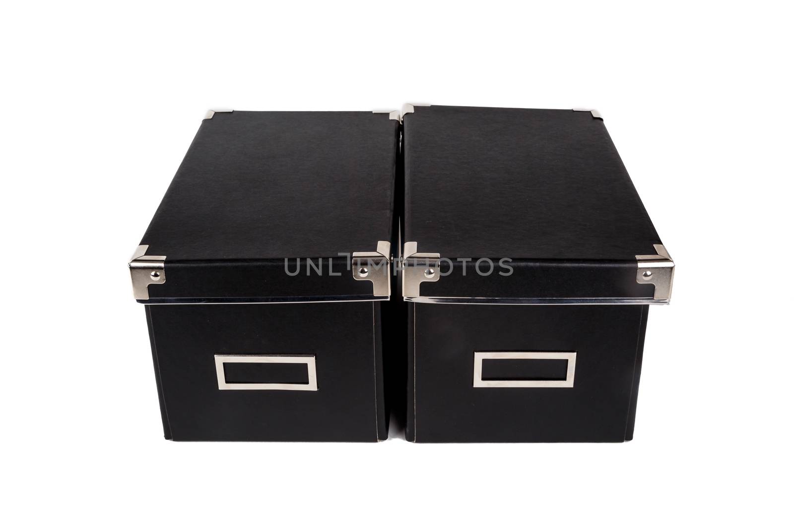 Close up view of two black cardboard box isolated on white background.