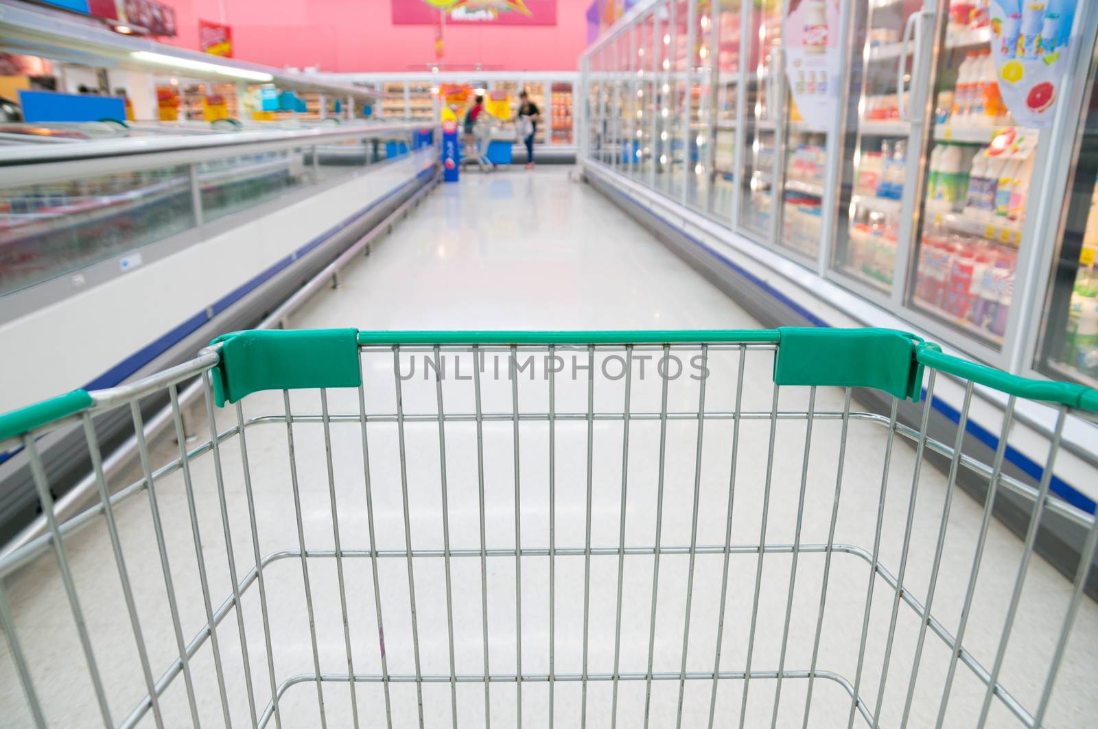 Abstract blurred photo of store with trolley in Supermarket store bokeh background