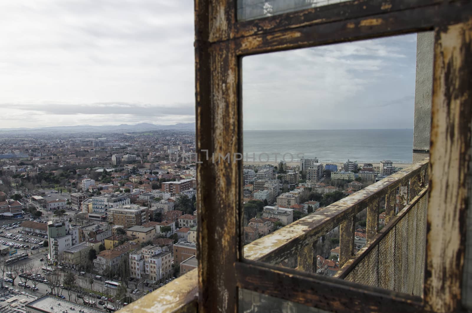 Italian city reflected on a rusty mirror