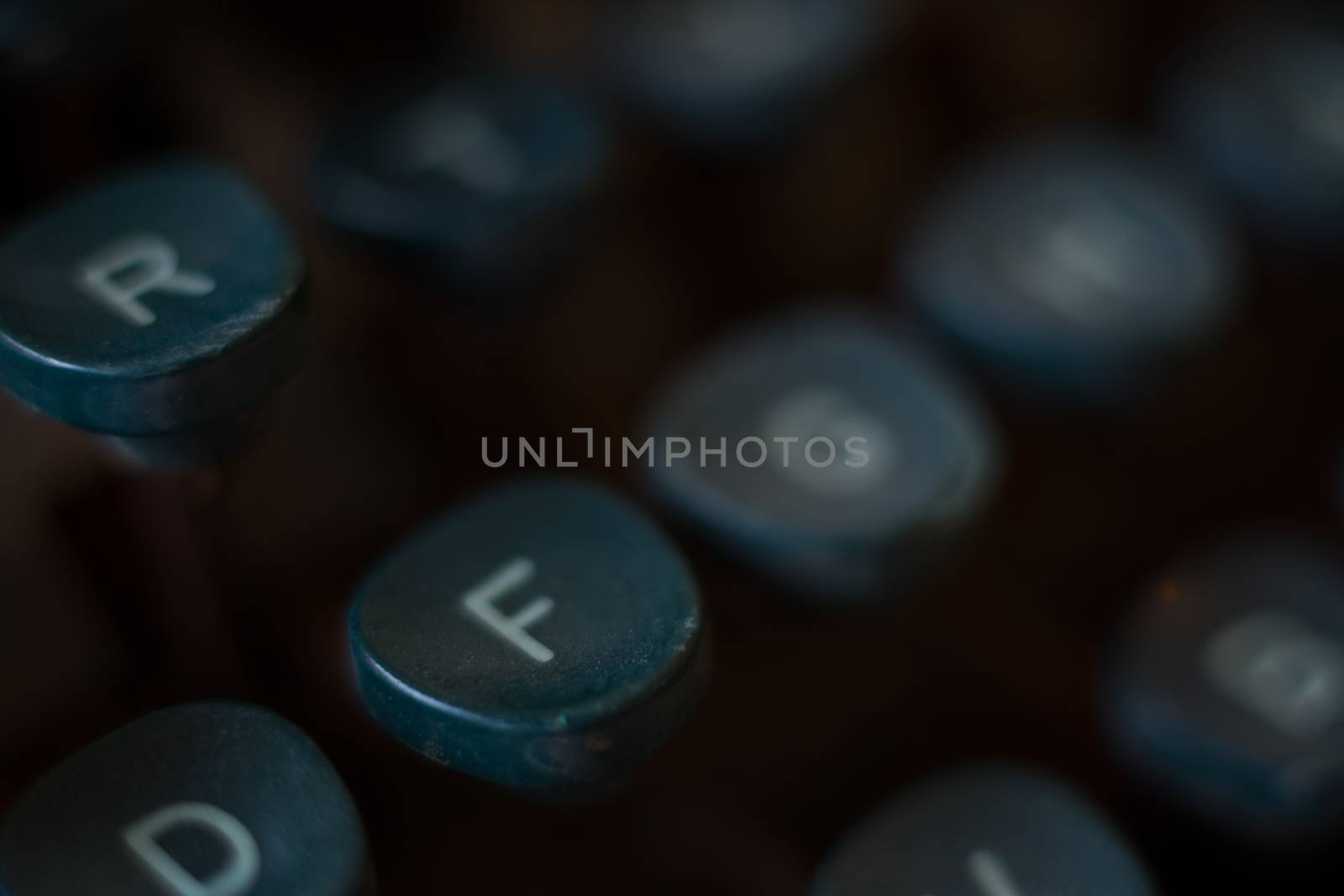 Typewriter Keys Blurred Close Up Image. Keyboard Detail of a Vintage Rusty Typewriter. Typewriter Buttons Background. Shallow Depth of Field.