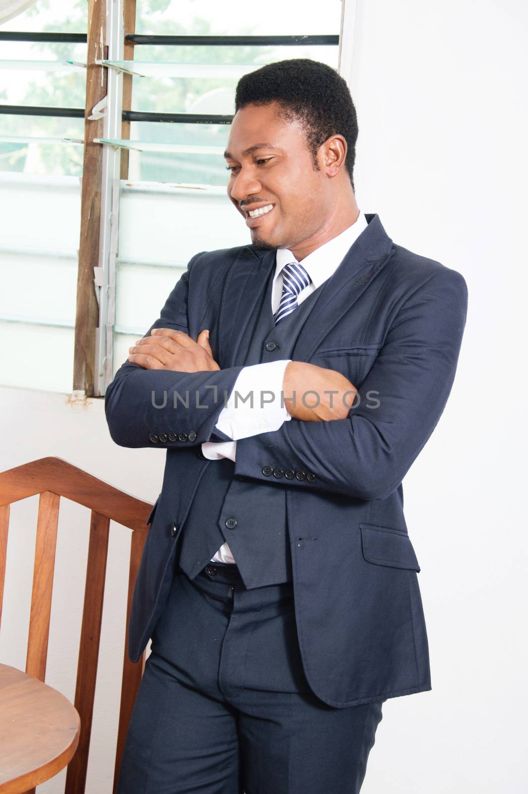 businessman is very happy this morning  because his bills are paid