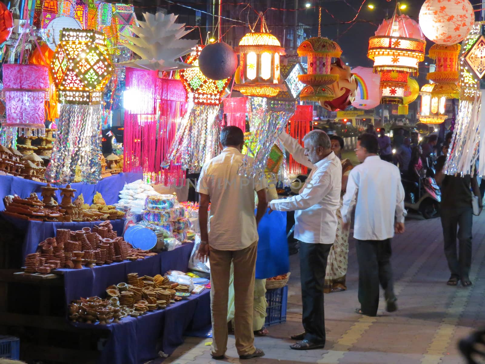 People shopping for lanterns and other traditional items on occassion of Diwali festival in India