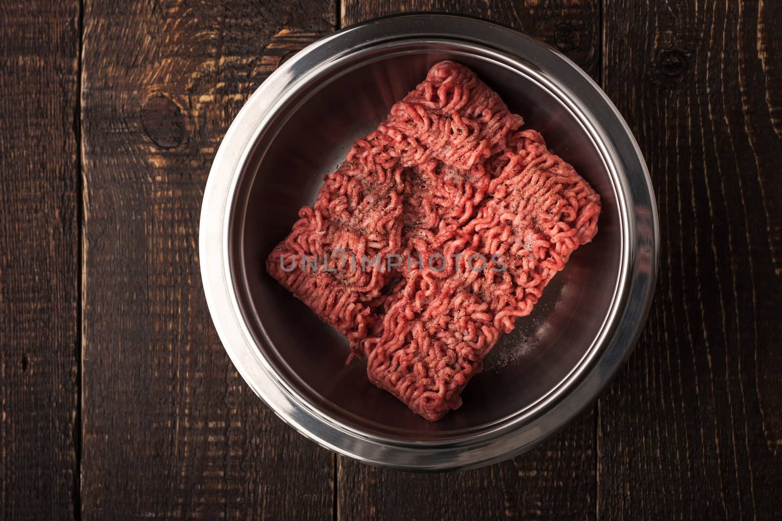 Ground beef with pepper in the metal pan by Deniskarpenkov