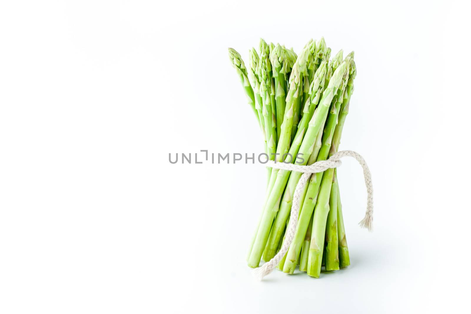 Bundle of asparagus on the white background horizontal