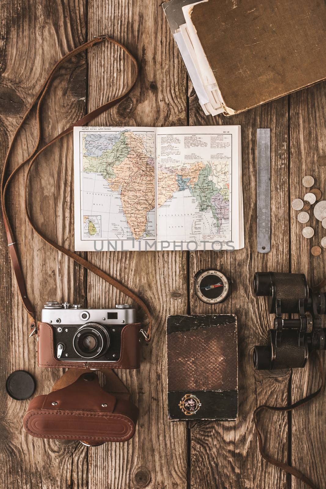 Set of traveler on the wooden background by Deniskarpenkov