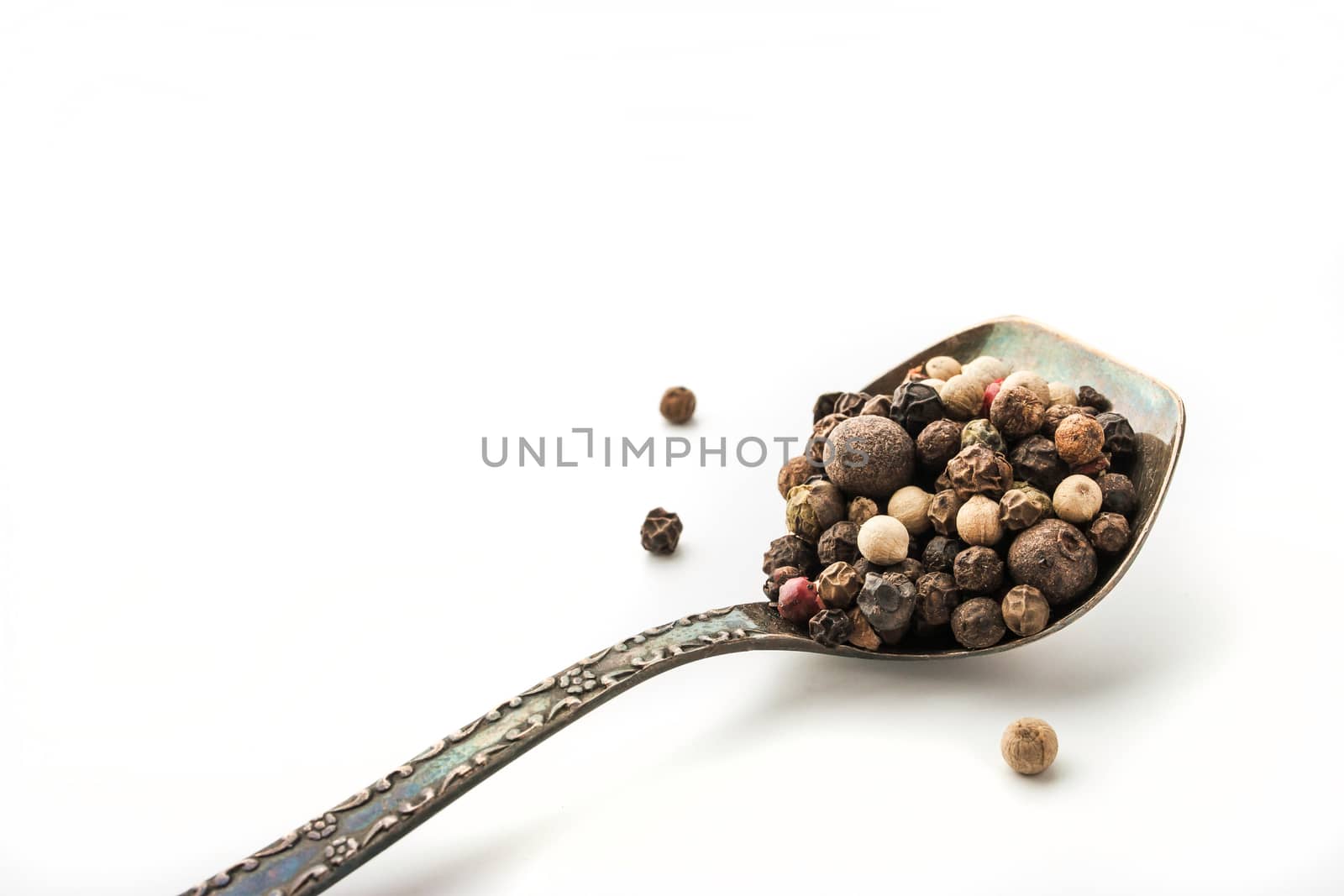 Pepper mix in the vintage metal spoon  at the  right