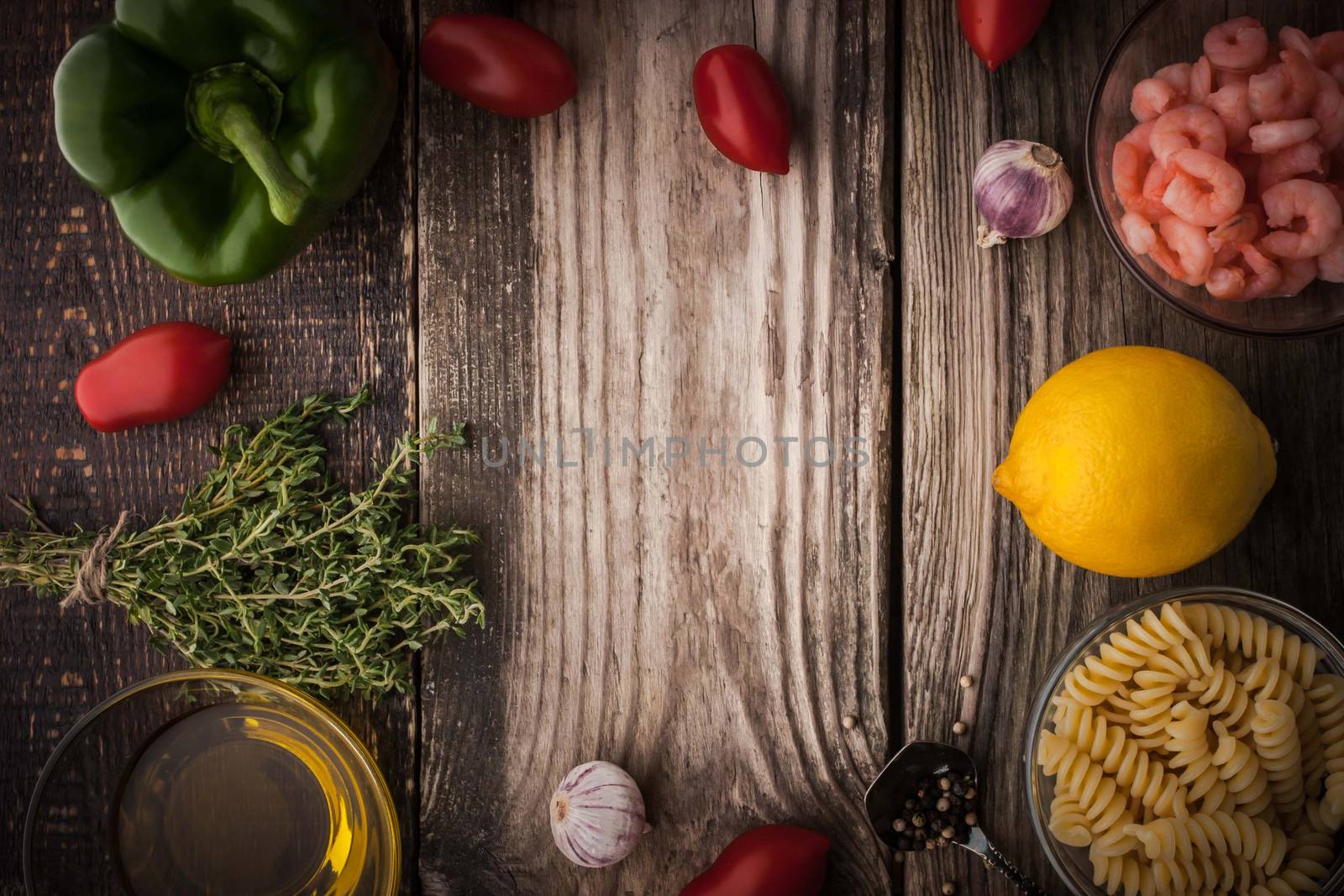 Vegetable with seasoning , shrimps and pasta on the wooden table horizontal
